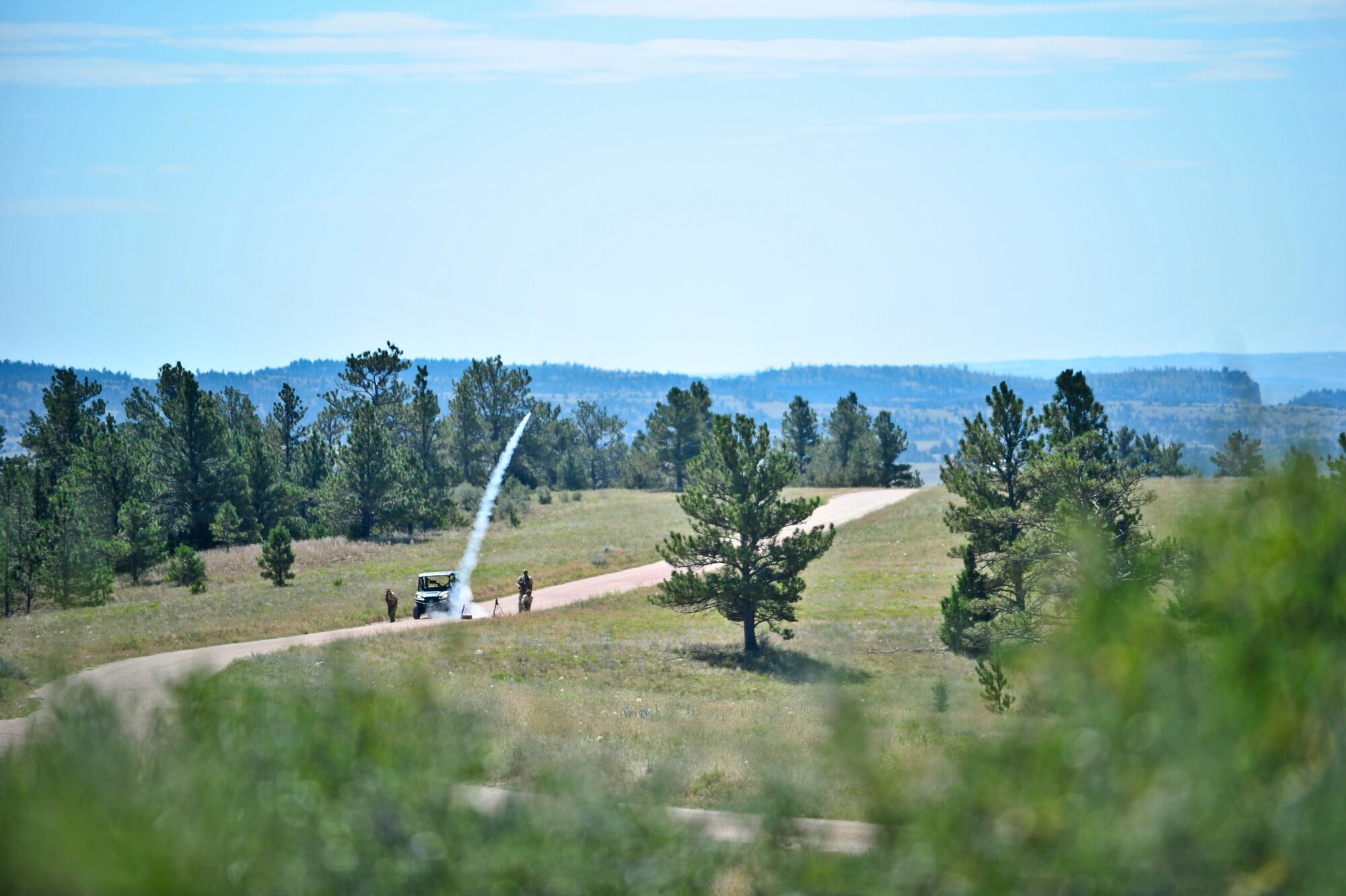 Acting as terrorists, Air Force Reservists fire a rocket towards a friendly village Aug. 13, 2015, at Camp Guernsey, Wyo. The 310th, 710th and 919th Security Forces Squadrons held a two-week field training exercise while living in field conditions.
(U.S. Air Force photos/Tech. Sgt. Nicholas B. Ontiveros)