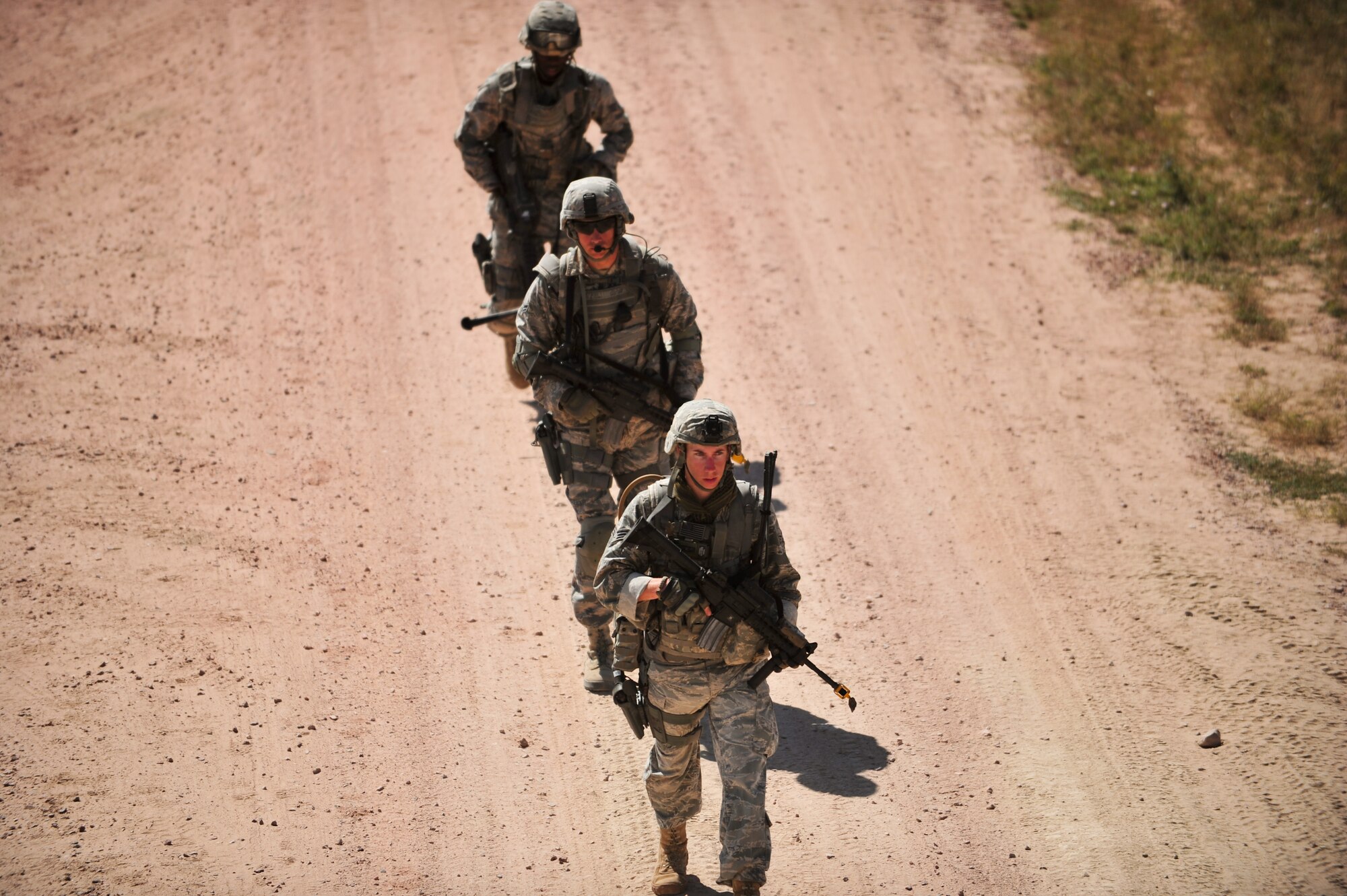 Air Force Reservists hike back to their base camp Aug. 11, 2015, at Camp Guernsey, Wyo. The 310th, 710th and 919th Security Forces Squadrons held a two-week field training exercise while living in field conditions.
(U.S. Air Force photos/Tech. Sgt. Nicholas B. Ontiveros)