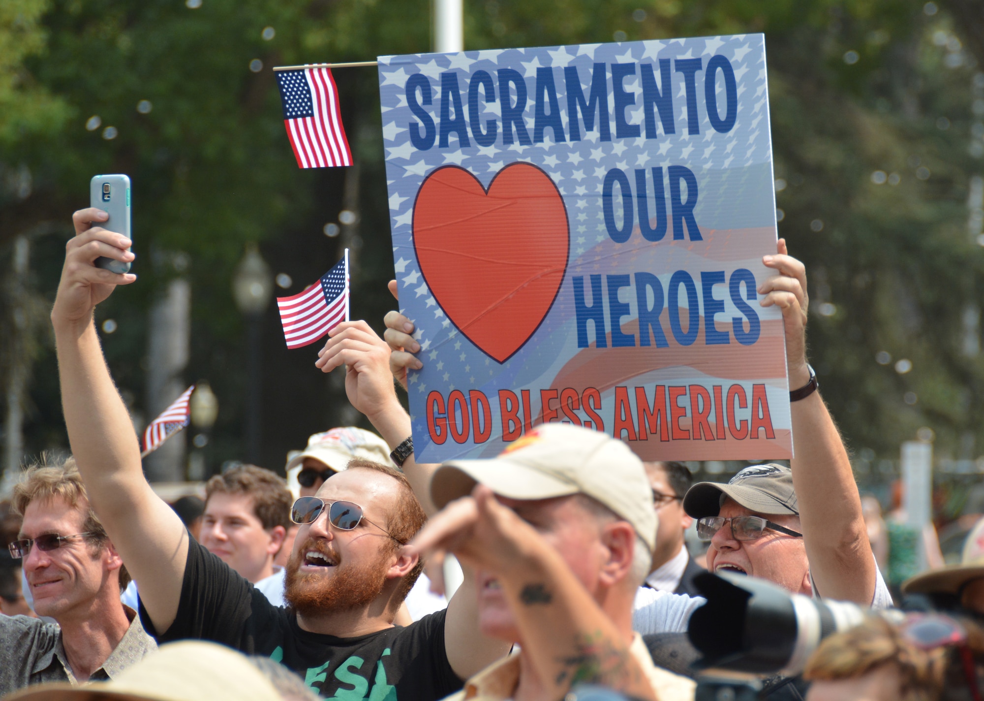 Hundreds of people lined the streets of downtown Sacramento to welcome home and honor Airman 1st Class Spencer Stone, Anthony Sadler and Alek Skarlatos. The trio of friends are responsible for thwarting a terrorist attack aboard a train headed toward Paris Aug. 21. (U.S. Air Force photo/2nd Lt. Stephen Collier)