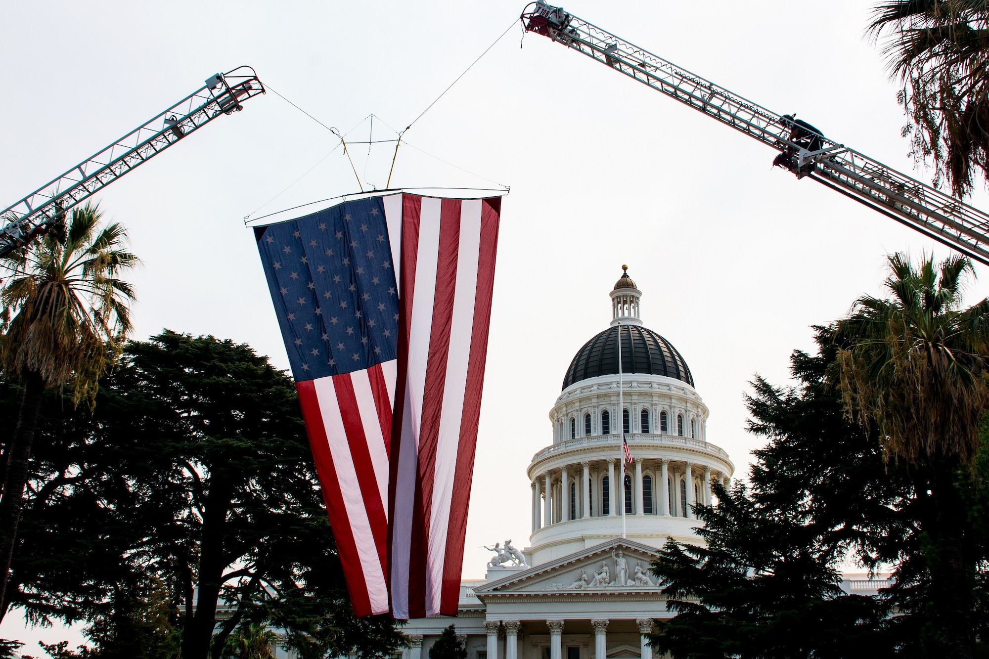 Hundreds of people lined the streets of downtown Sacramento to welcome home and honor Airman 1st Class Spencer Stone, Anthony Sadler and Alek Skarlatos, Sept. 11, 2015. The trio of friends are responsible for thwarting a terrorist attack aboard a train headed toward Paris Aug. 21. (U.S. Air Force photo/Senior Airman Charles Rivezzo)