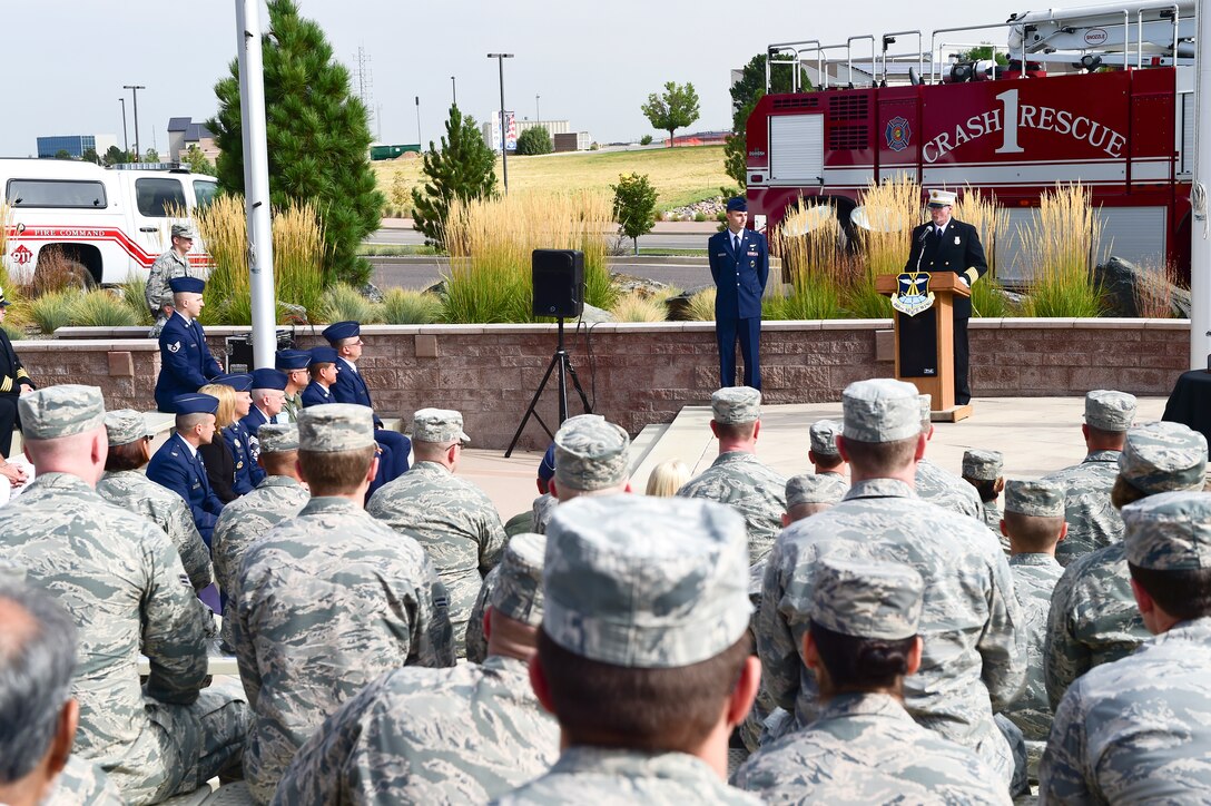 Tim Bosch, Buckley Fire Department fire chief, speaks to members of Team Buckley during the Patriot Day Ceremony Sept. 11, 2015, at the Headquarters Building on Buckley Air Force Base, Colo. Patriot Day is the national day of service and remembrance, in memory of the thousands killed on U.S. soil in the 9/11 attacks. (U.S. Air Force photo by Senior Airman Phillip Houk/Released)