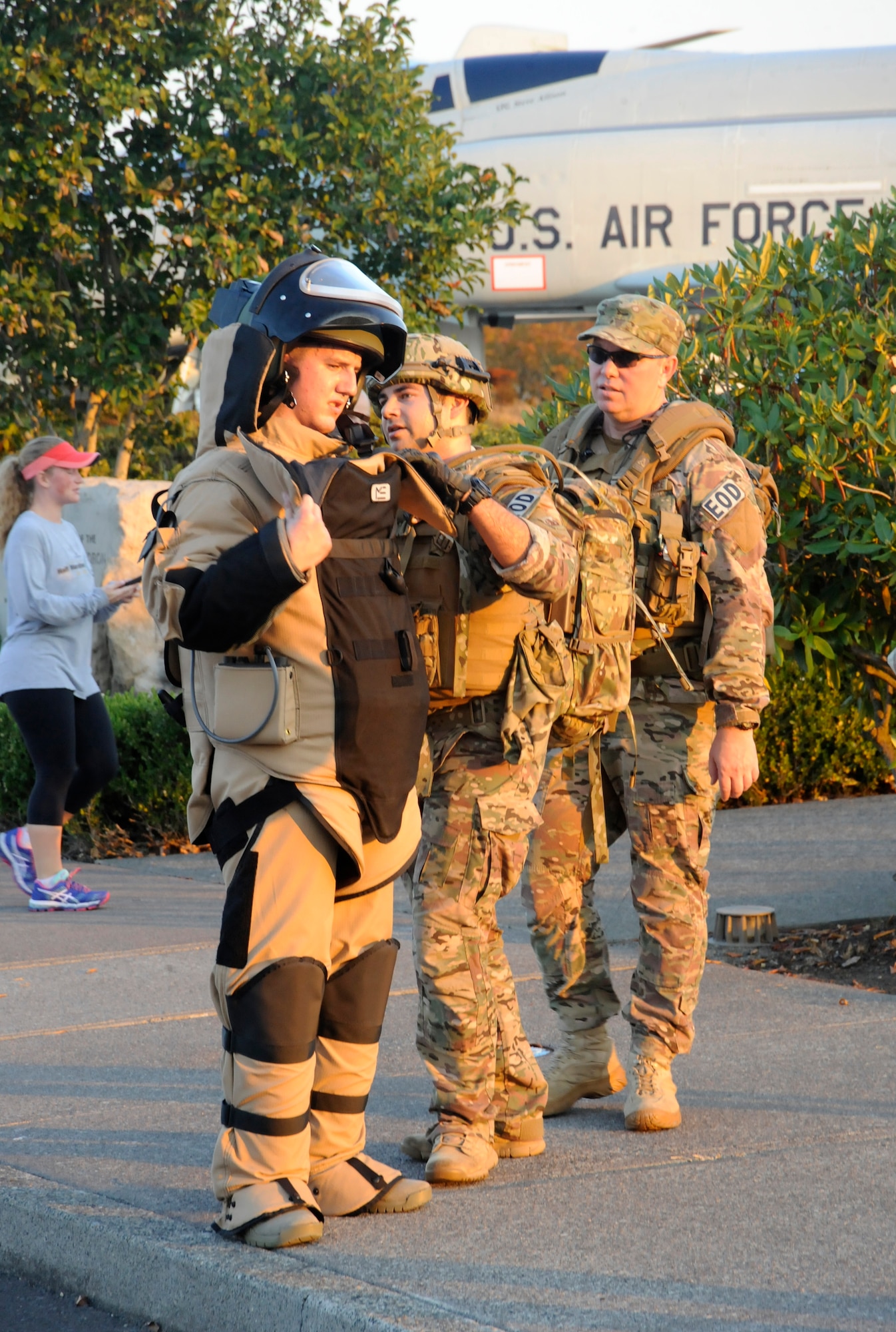 Oregon Airman 1st Class Alec Camp, an Explosive Ordinance Disposal (EOD) technician, left, has assistance from other EOD members from the 142nd Fighter Wing Civil Engineer Squadron following the ‘Ruck, Run and Walk’, at the Portland Air National Guard Base, Ore., Sept. 11, 2015. (U.S. Air National Guard photo by Tech. Sgt. John Hughel, 142nd Fighter Wing Public Affair/Released)