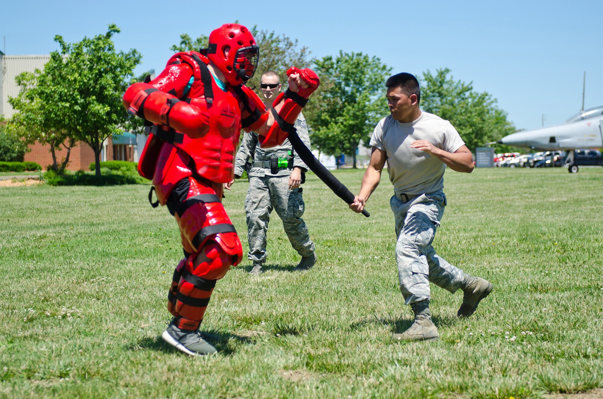 Senior Airman Reymart Relos (right), a services technician for the 123rd Force Support Squadron, attacks a 123rd Security Forces Squadron member during baton training as part of a week-long course for security forces augmentees at the Kentucky Air National Guard Base in Louisville, Ky., May 19, 2015. The course is designed to train Airmen from other career fields to perform base security functions, providing a pool of Airmen to assist the 123rd Security Forces Squadron during shortfalls in manning due to emergencies. (U.S. Air National Guard photo by Master Sgt. Phil Speck)