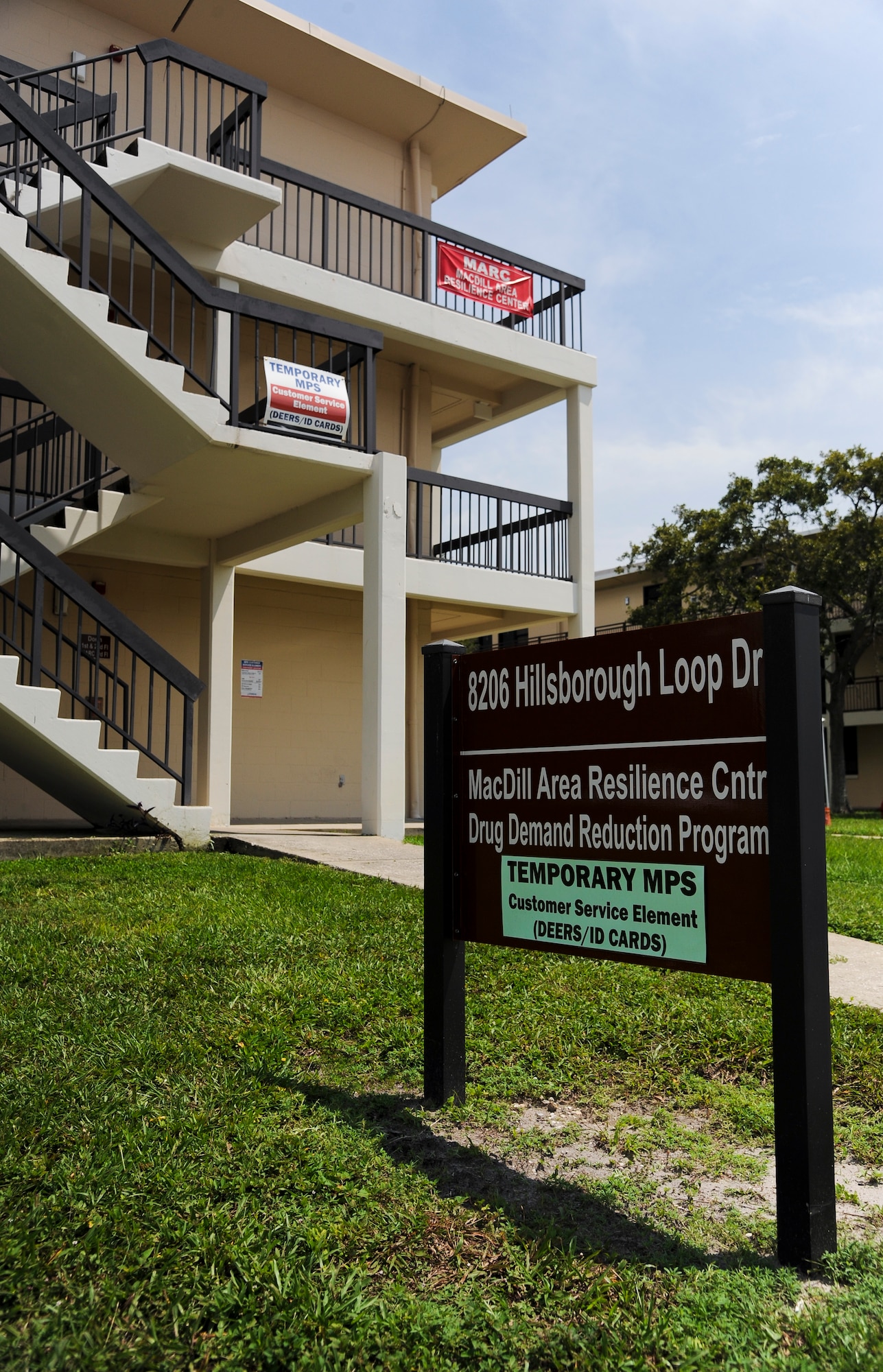 A sign identifies the temporary location of the Military Personnel Section at MacDill Air Force Base, Fla., Sept. 10, 2015. The Identification Card, in-processing and passports offices can be found on the first floor of building 378, which is located next to the Diner’s Reef Dining Facility. (U.S. Air Force photo by Airman 1st Class Danielle Quilla/Released)