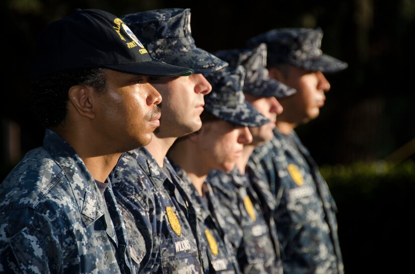Sailors form up before a 9/11 moment of silence remembrance ceremony at Joint Base Charleston – Weapons Station, S.C. After the ceremony, the Sailors shared where they were during the 9/11 terrorist attacks. (U.S. Air Force photo/Staff Sgt. AJ Hyatt)
