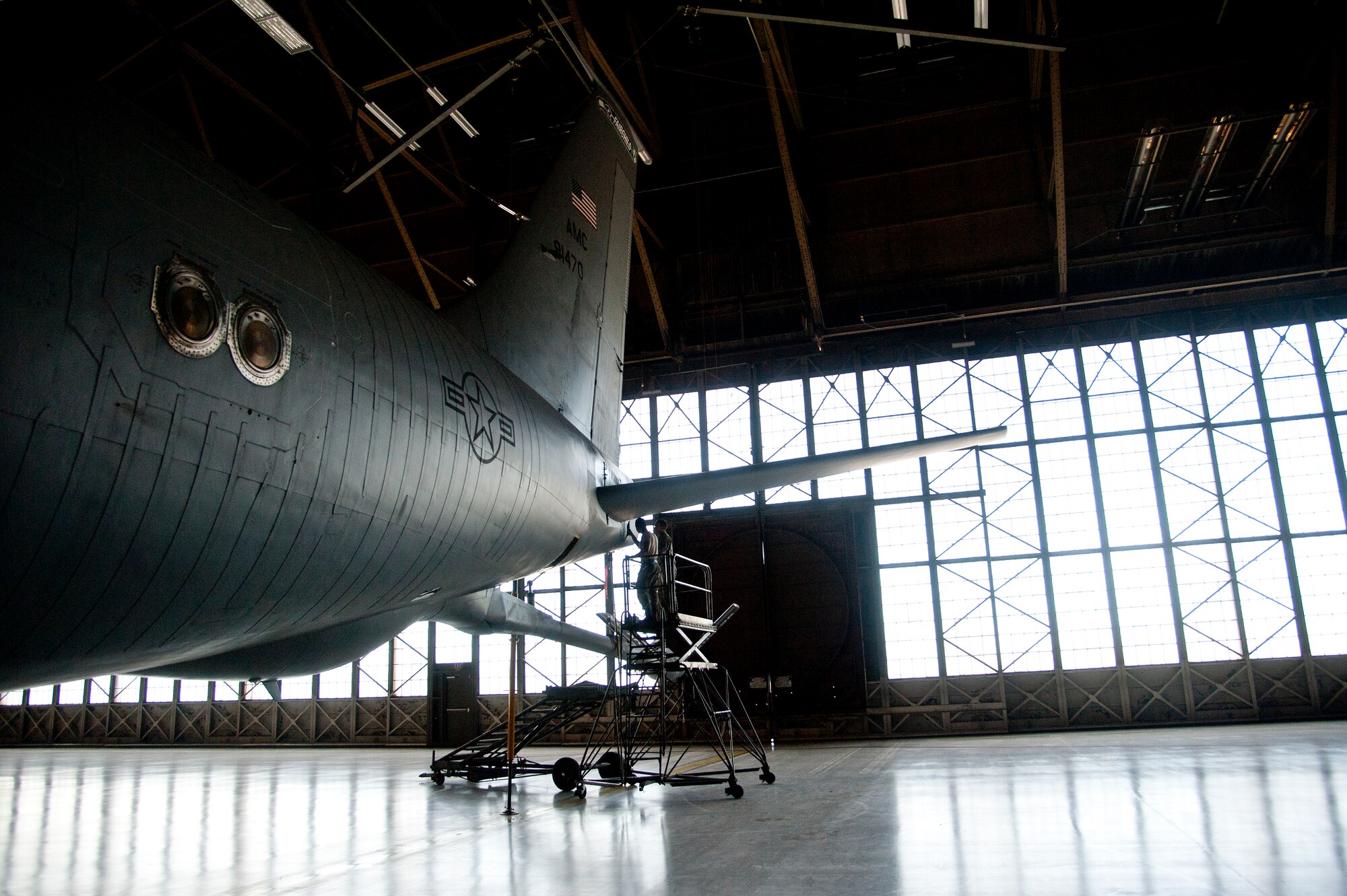 Airmen with the 92nd Aircraft Maintenance Squadron inspect a KC-135 Stratotanker prior to a 900-hour inspection Sept. 9, 2015, at Fairchild Air Force Base, Wash. AMXS Airmen conduct an inspection every 900 flight-hours for any damage caused during flight. (U.S. Air Force photo/Airman 1st Class Mackenzie Richardson)