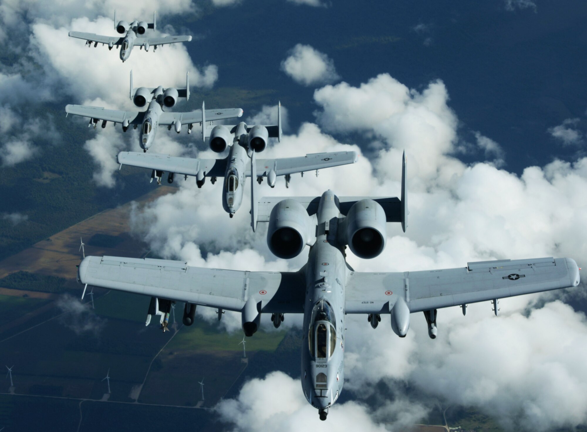 A-10 Thunderbolt IIs from Whiteman Air Force Base, Missouri, get into formation, Sept. 9, 2015, after receiving fuel from a KC-135 Stratotanker assigned to RAF Mildenhall, England, over Estonia. The A-10s, commonly known by its nickname “Warthog,” deployed and participated in the air refueling in support of a NATO-led operation.  (U.S. Air Force photo by Airman 1st Class Justine Rho/Released)