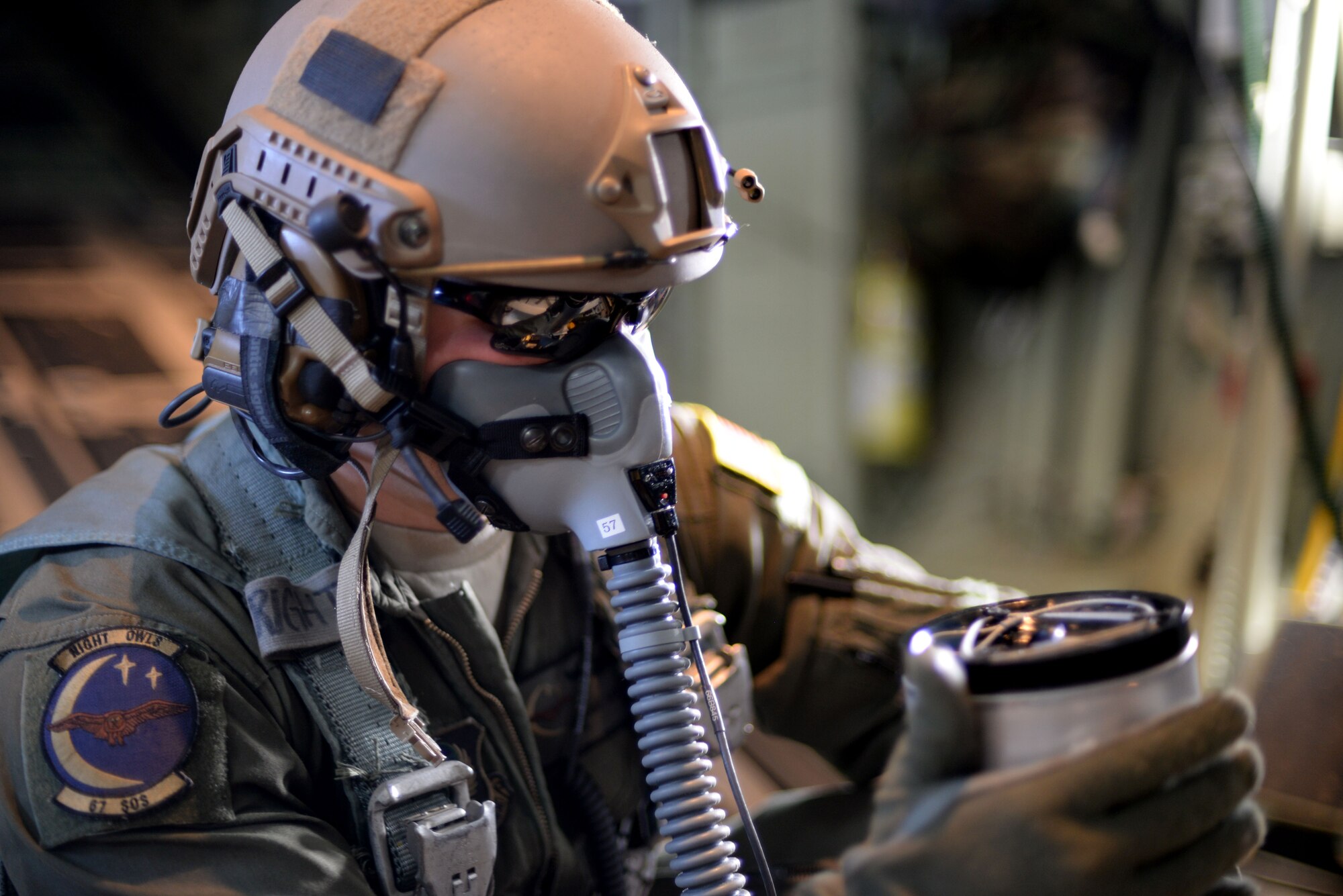 U.S. Air Force Senior Airman Jeremie Anderson, 67th Special Operations Squadron MC-130J Commando II loadmaster, inspects LUU-4/B flares during a training mission Sept. 8, 2015, over the North Sea. Anderson tossed the flares from the back of the aircraft for 48th Fighter Wing F-15 pilots to track, target and destroy. The 67th SOS and the 48th FW organized the two-day mission in order to provide realistic targeting training for F-15 pilots. Although the primary use of the flares are for search and rescue missions, instead they were used for targeting practice due to an upcoming expiration date. (U.S. Air Force photo by Tech. Sgt. Austin May/Released)