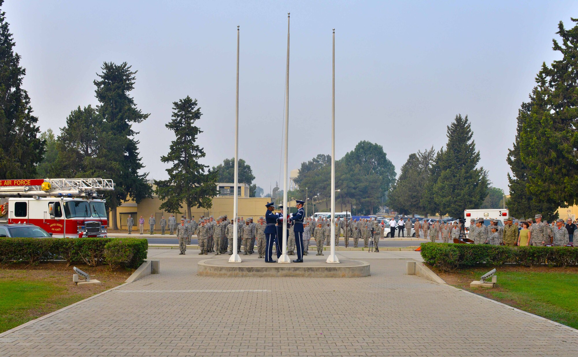 Members of the Incirlik Honor Guard raise the U.S. flag during a 9/11 Remembrance Ceremony Sept. 11, 2015, at Incirlik Air Base, Turkey. Approximately 200 members of Team Incirlik attended the ceremony to honor and remember the victims of the 9/11 attacks. (U.S. Air Force photo by Senior Airman Michael Battles)