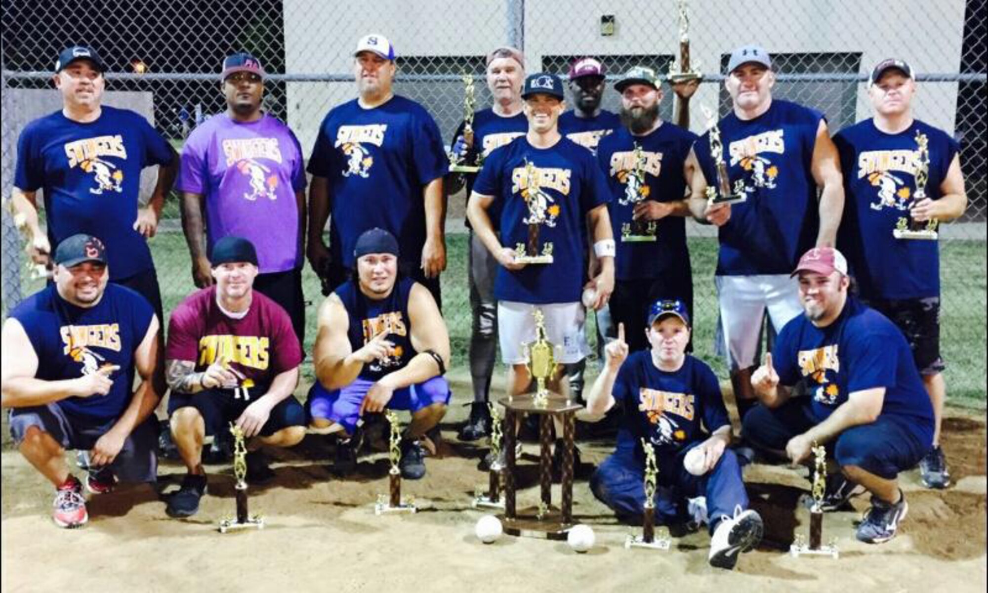 The Swingers relish their ninth base championship Sept. 3 after defeating the Silverbacks in the final. Standing from left to right, back row, are Deano Smith, James Robinson, Bud Cox, Bama Phillips, Ryan Hurst, Mike Bryant, Glen Kierstead, Travis Moore and Bobby Barbee. Up front are Jimmy Bland, Brad Jackson, Doak Wishon, Robert Mahan and Robby Foreman. Not pictured are John Kinnamon and Brandon Pearson. (Courtesy photo/Released)