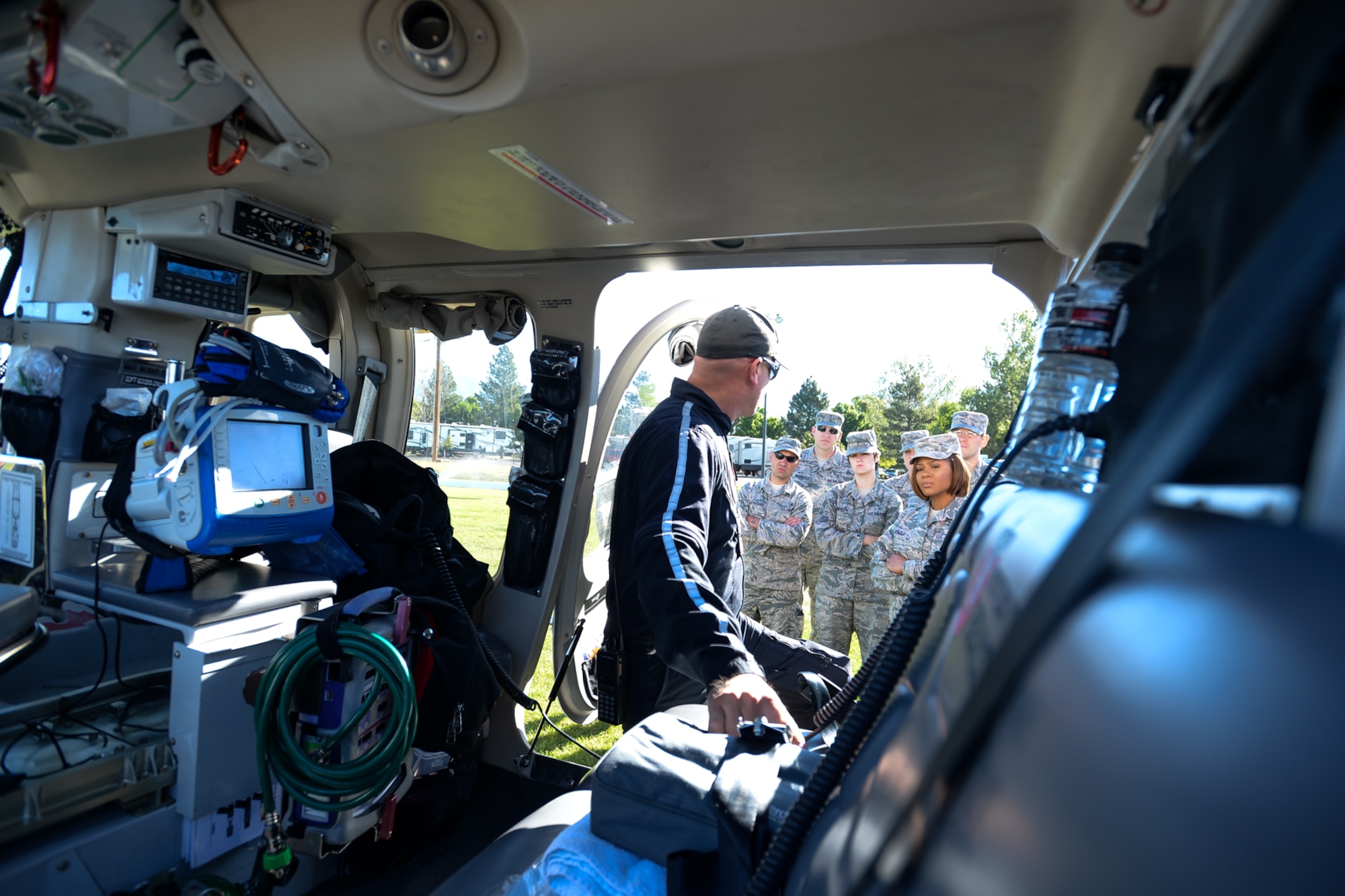 Flight nurse Brandon Smoot talks with Airmen assigned to the 75th Medical Group about the capabilities of the AirMed trauma response helicopter during a familiarization event, Sept. 9, 2015. (U.S. Air Force photo by R. Nial Bradshaw)