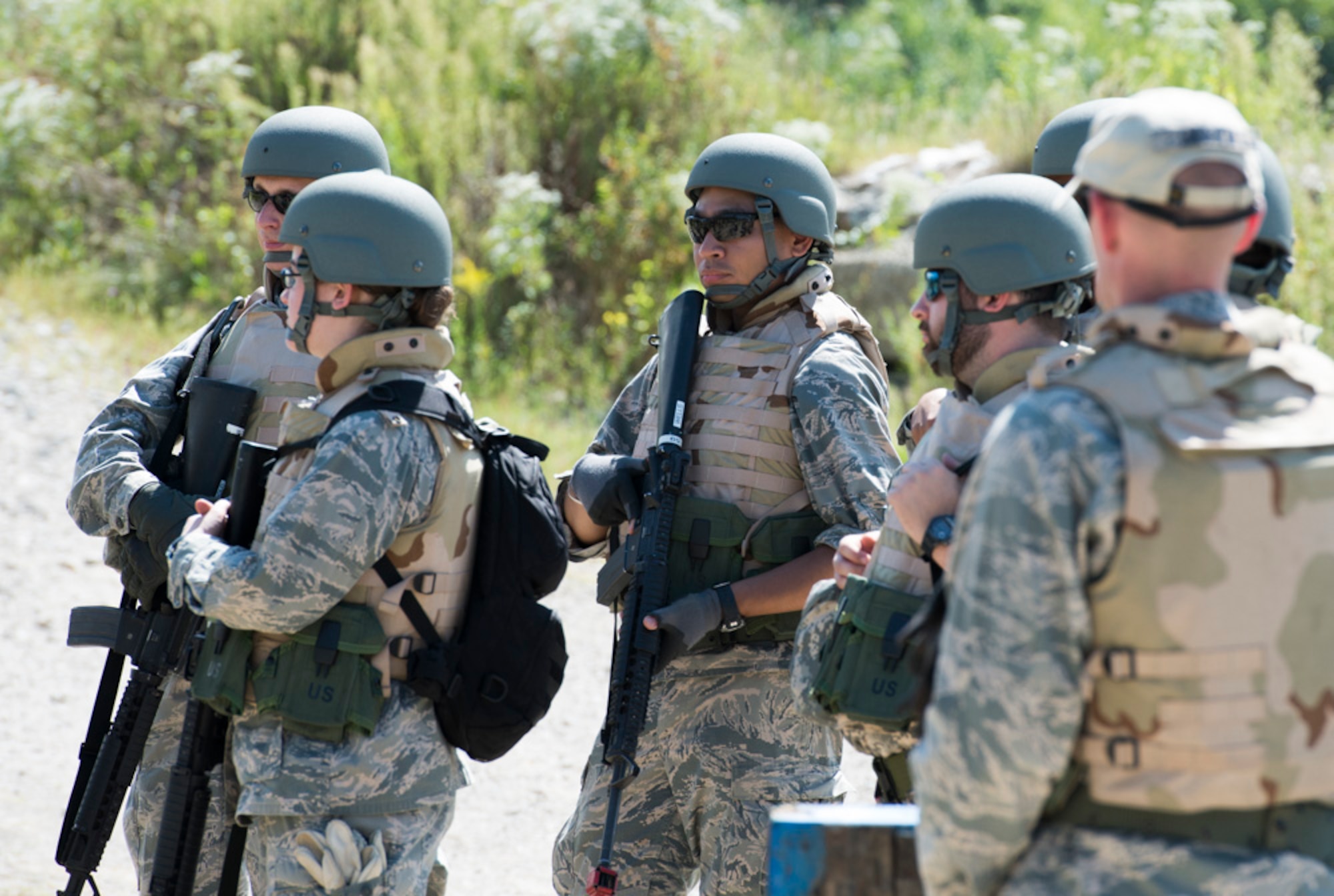 Participants in the Air Force Research Laboratory 2015 Tech Warrior exercise learn some of the basics of running an entry control point, Sept. 10, 2015, at the National Center for Medical Readiness, Fairborn, Ohio. During the exercise participants are learning a variety of skills such as base defense, self-aide buddy care, tactical vehicle driving and land navigation. (U.S. Air Force photo by Wesley Farnsworth / Released)