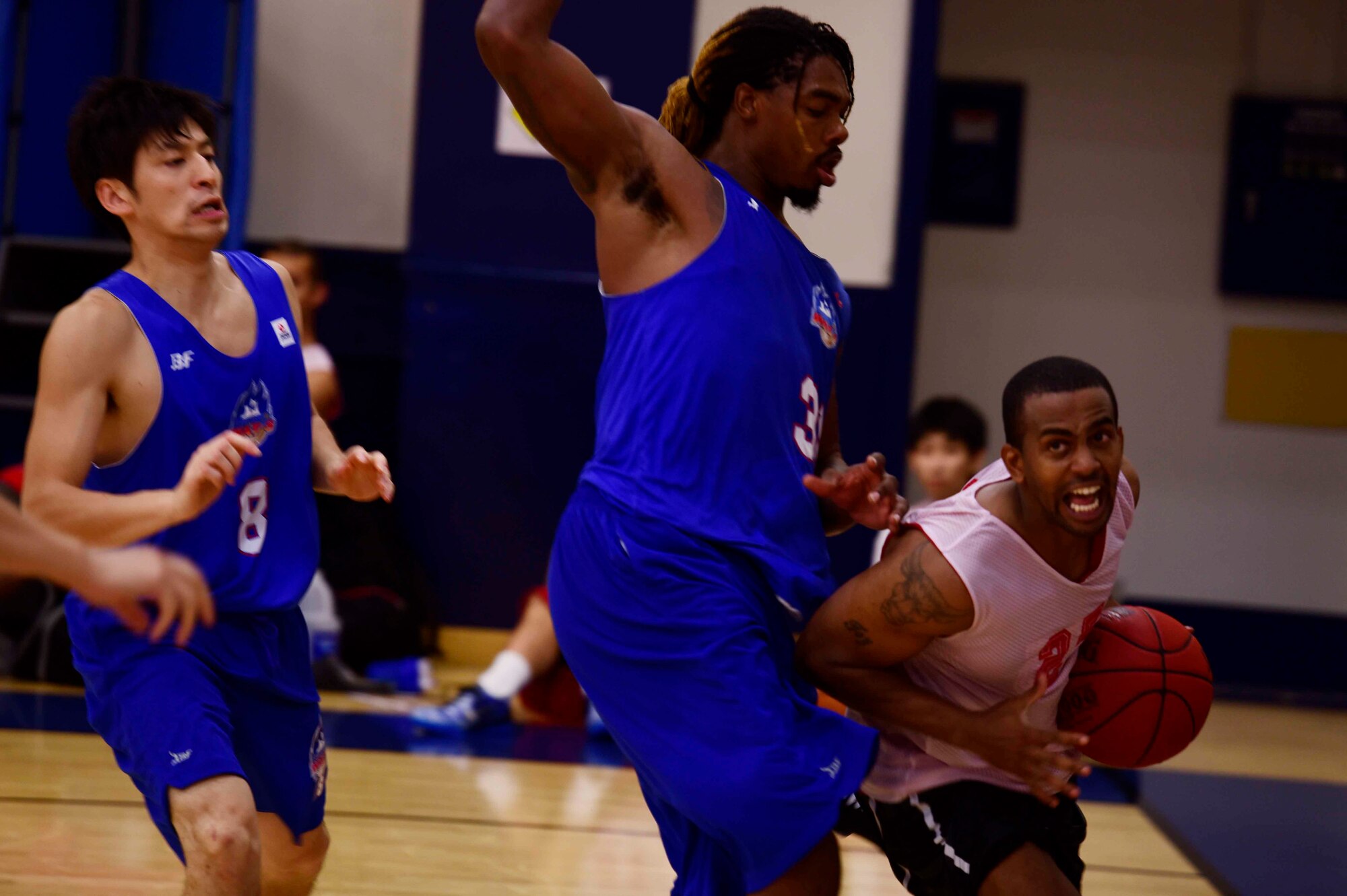 A member of the Misawa Jets goes for a lay-up at Misawa Air Base, Japan, Sept. 6, 2015. Misawa?s basketball team played against the Aomori Wats, a three-year-old Japanese Basketball Japanese League professional team based out of Aomori City, Japan. (U.S. Coast Guard photo by Petty Officer 3rd Class Kyle Fetter/Released)