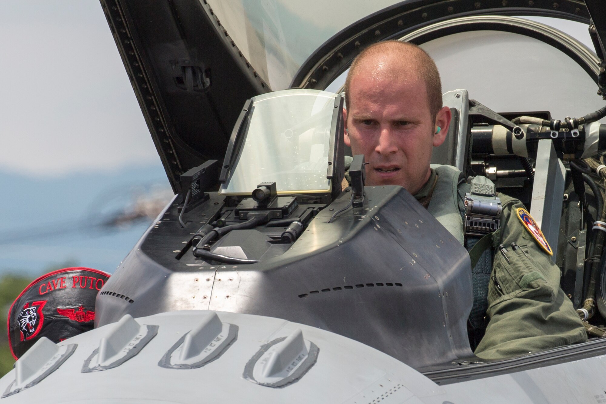 Lt. Col. Kevin Lord, 35th Fighter Wing inspector general, performs a pre-flight inspection of a F-16 Fighting Falcon at Yokota Air Base, Japan, July 24, 2015. Nineteen years ago, Lord took off from Yokota's runway in a Cessna-152 with aspirations to be a pilot in the United Sates Air Force. Now, in 2015, he is a lieutenant colonel and F-16 pilot. (U.S. Air Force photo by Osakabe Yasuo/Released)