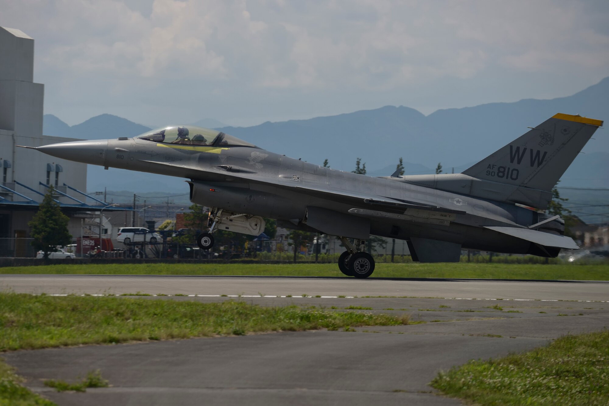 An F-16 Fighting Falcon from Misawa Air Base, Japan, touches down during an aircraft arresting system test certification at Yokota Air Base, Japan, June 24, 2015. The annual certification checks the integrity of the barrier's hydraulic system and the system as a whole. (U.S. Air Force photo by Senior Airman David Owsianka/Released)