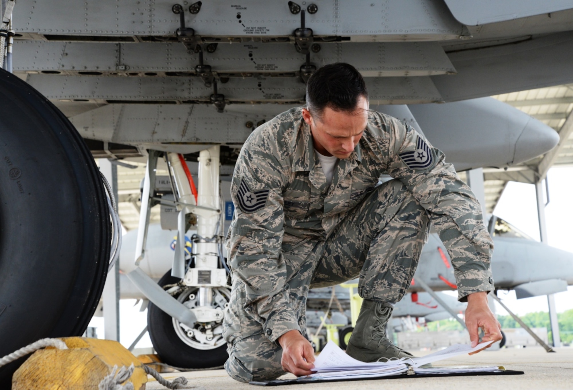 Tech. Sgt. Christipher R. Kelley, 175th Aircraft Maintenance Squadron, is the Maryland Air National Guard September Airman Spotlight. Here he checks a maintenance log for an A-10C Thunderbolt II June 7 at Warfield Air National Guard Base. (U.S. Air National Guard photo by Airman 1st Class Enjoli Saunders)
