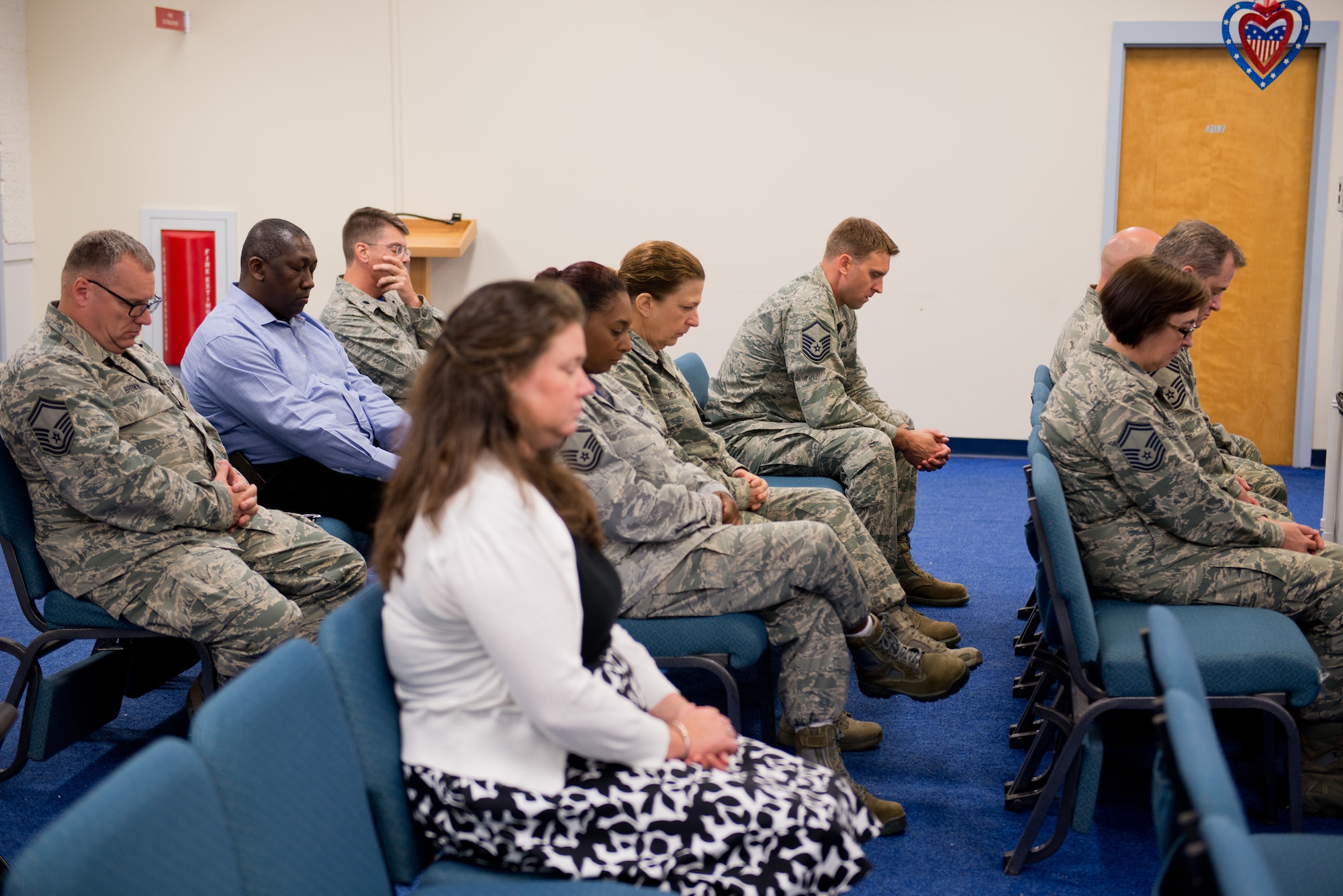 Members of the 102nd IW have a moment of silence for all the victims of 9/11. By Staff Sgt. Veuril McDavid