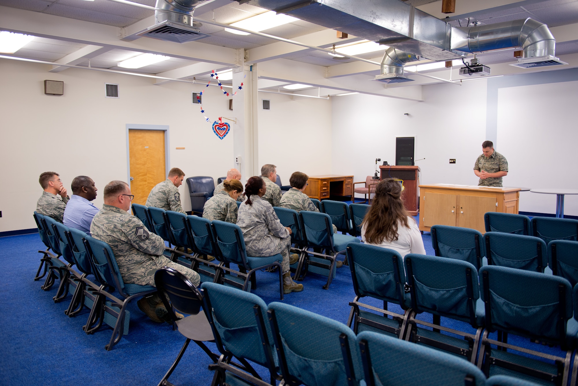Members of the 102nd IW at morning's service pay tribute to the heroes and honor the memory of the victims of 9/11. By Staff Sgt. Veuril McDavid