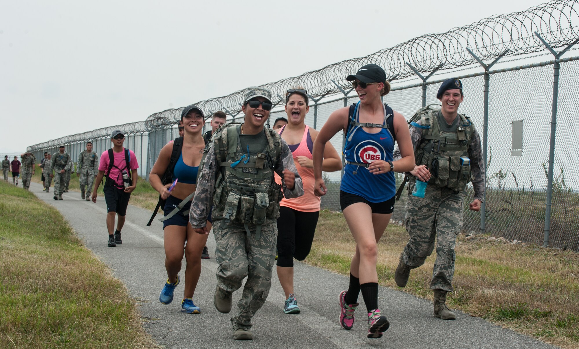 Airmen from the 8th Fighter Wing partake in a six-mile ruck march as part of 9-11 Remembrance Day at Kunsan Air Base, Republic of Korea, Sept. 11, 2015. The day's events also included a first-responder stair climb and a 9-11 Remembrance Day Ceremony. (U.S. Air Force photo by Staff Sgt. Nick Wilson/Released)