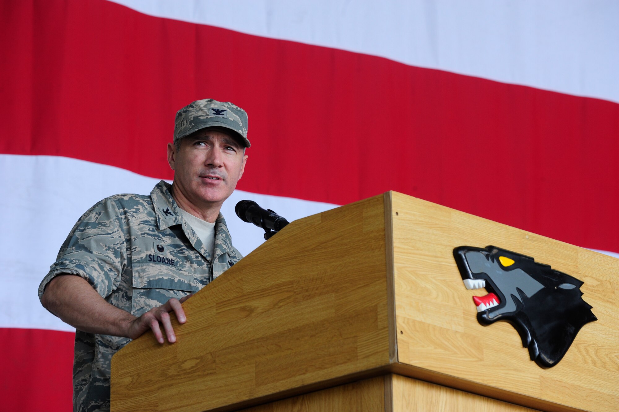 Col. Jeremy Sloane, 8th Fighter Wing commander, gives a speech during a 9-11 Remembrance Day Ceremony at Kunsan Air Base, Republic of Korea, Sept. 11, 2015. United States Air Force Airmen and Republic of Korea air force members attended the ceremony to the remember the events that occurred during the terrorist attacks14 years ago. (U.S. Air Force photo by Staff Sgt. Nick Wilson/Released)