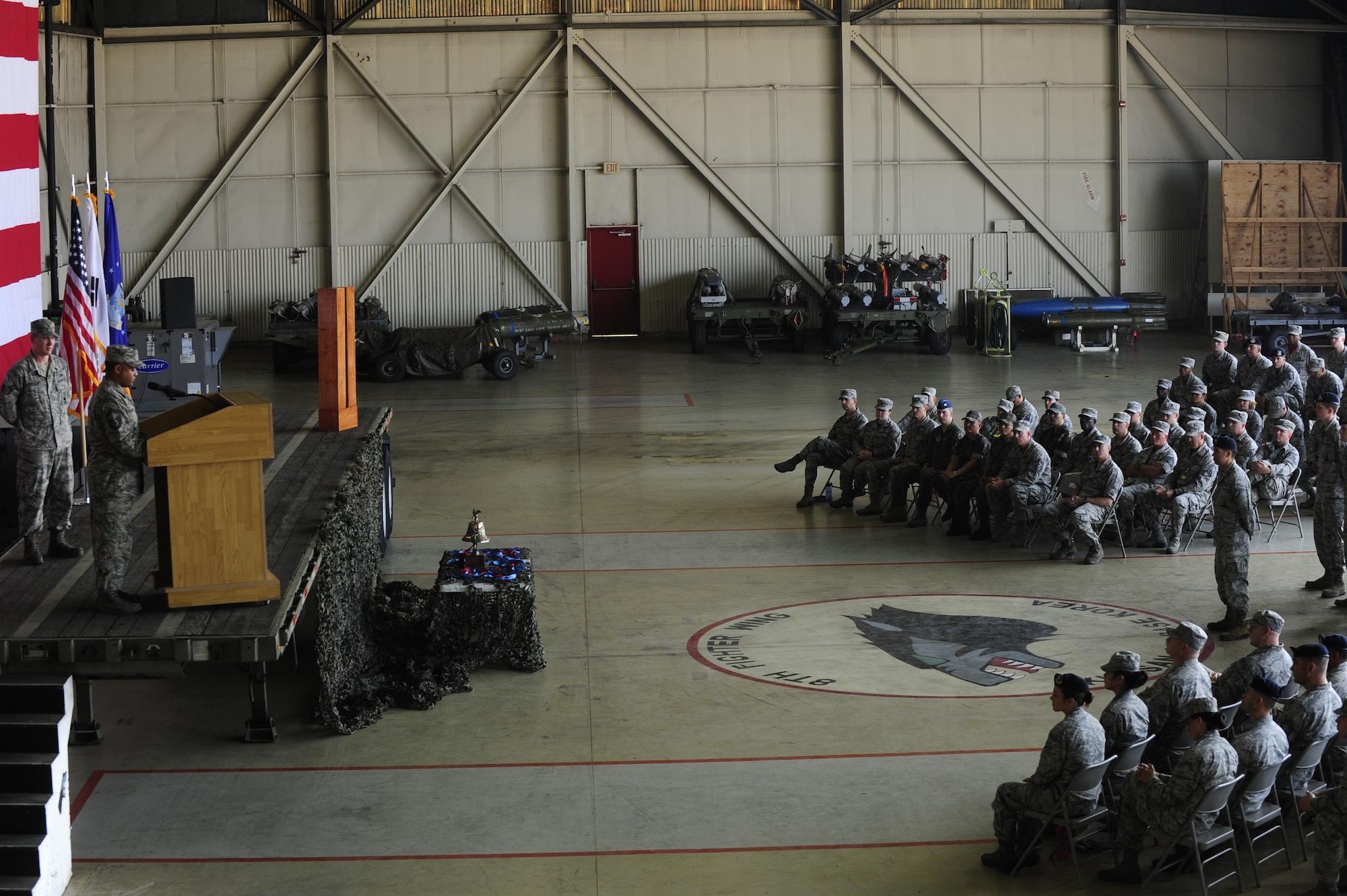 Airmen from the 8th Fighter Wing attend a 9-11 Remembrance Day Ceremony at Kunsan Air Base, Republic of Korea, Sept. 11, 2015. United States Air Force Airmen and Republic of Korea air force members attended the ceremony to the remember the events that occurred during the terrorist attacks14 years ago. (U.S. Air Force photo by Staff Sgt. Nick Wilson/Released)