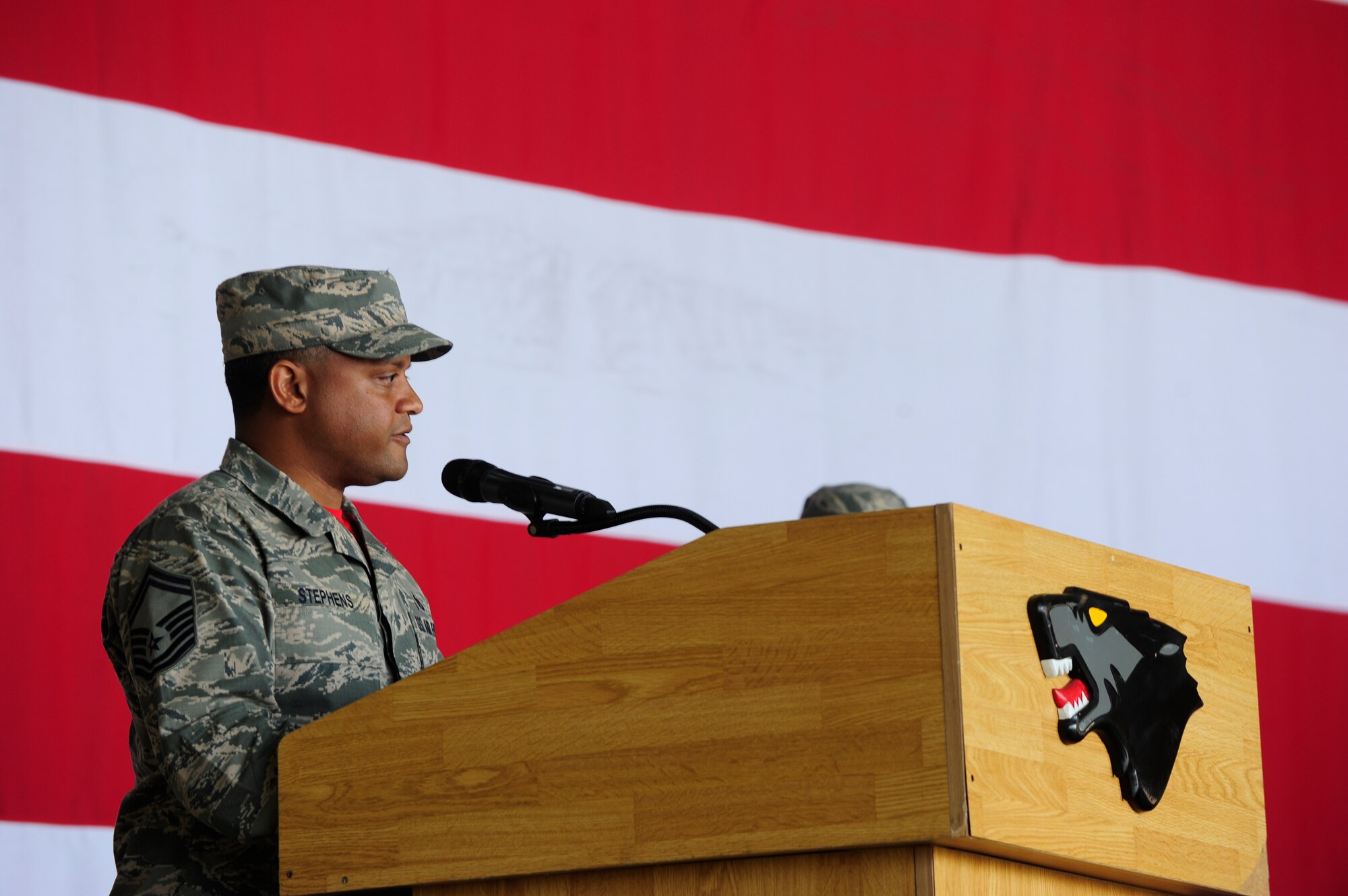 Senior Master Sgt. Henry Stephens gives a speech during a 9-11 Remembrance Day Ceremony at Kunsan Air Base, Republic of Korea, Sept. 11, 2015. United States Air Force Airmen and Republic of Korea air force members attended the ceremony to the remember the events that occurred during the terrorist attacks14 years ago. (U.S. Air Force photo by Staff Sgt. Nick Wilson/Released)