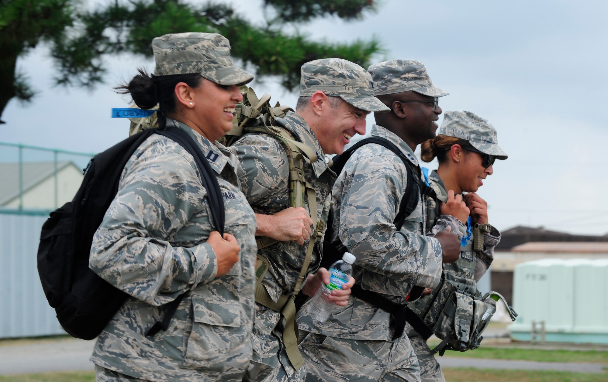 Airmen from the 8th Fighter Wing partake in a six-mile ruck march as part of 9-11 Remembrance Day at Kunsan Air Base, Republic of Korea, Sept. 11, 2015. The day's events also included a first-responder stair climb and a 9-11 Remembrance Day Ceremony. (U.S. Air Force photo by Staff Sgt. Nick Wilson/Released)