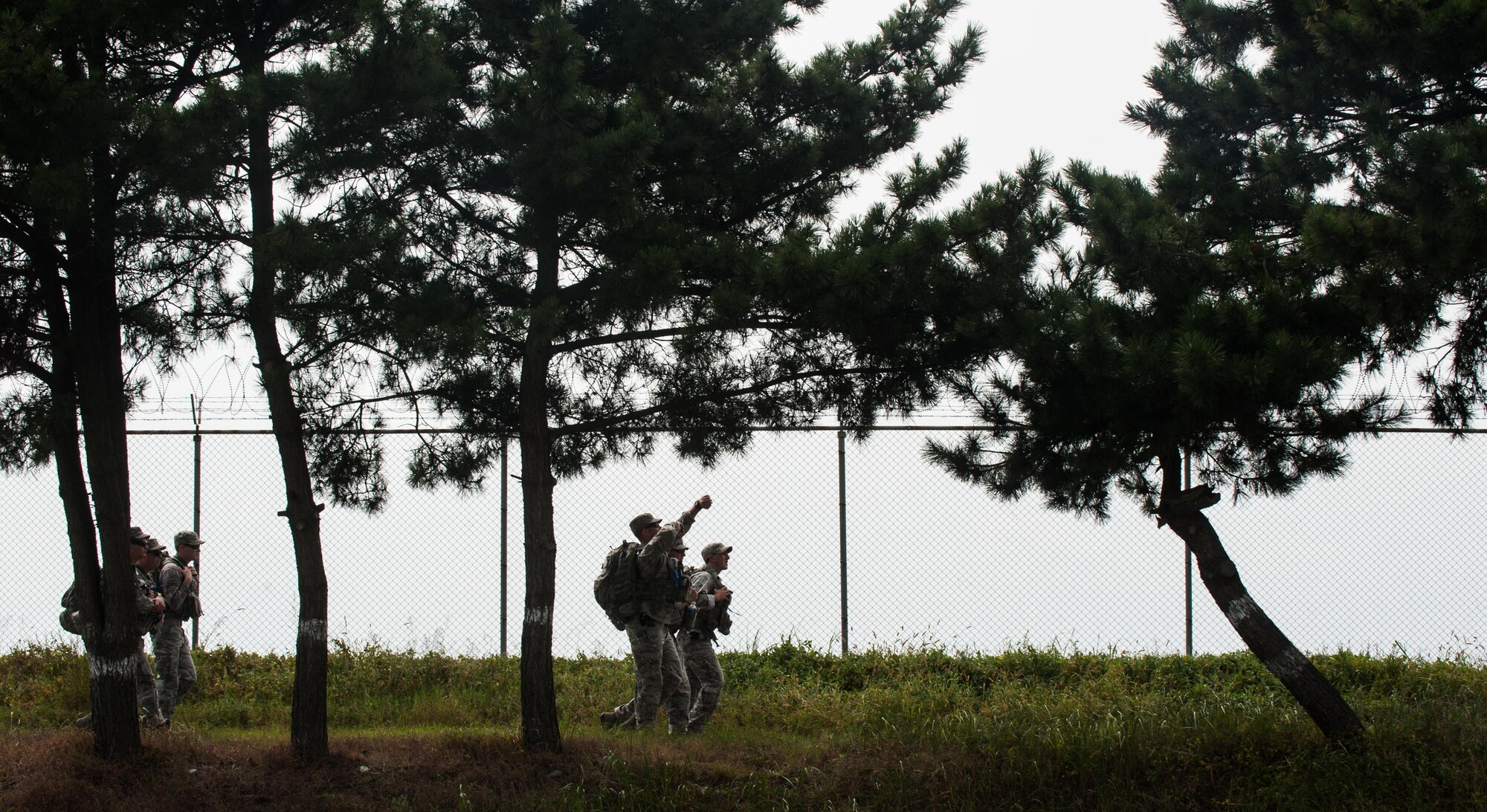 Airmen from the 8th Fighter Wing partake in a six-mile ruck march as part of 9-11 Remembrance Day at Kunsan Air Base, Republic of Korea, Sept. 11, 2015. The day's events also included a first-responder stair climb and a 9-11 Remembrance Day Ceremony. (U.S. Air Force photo by Staff Sgt. Nick Wilson/Released)
