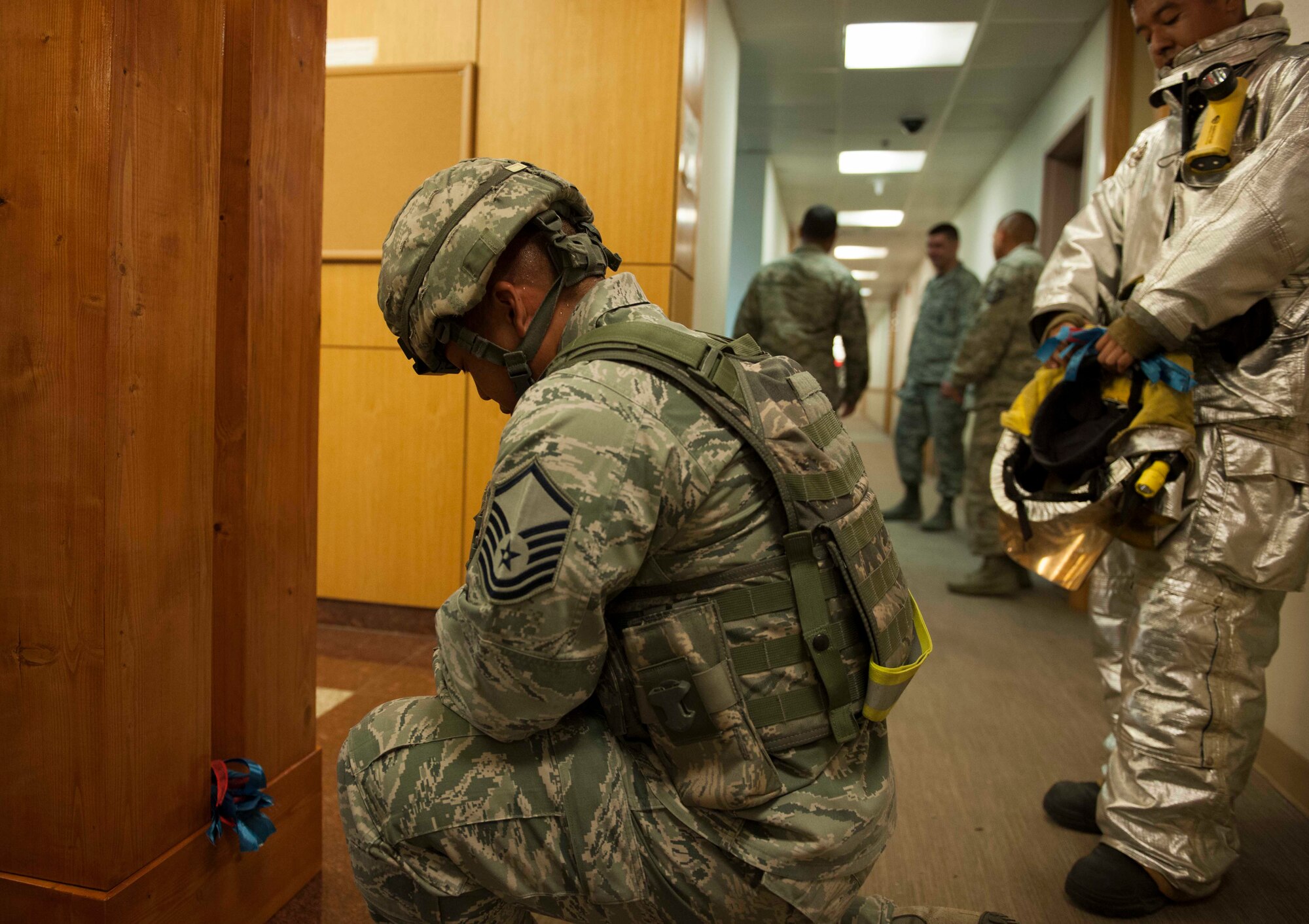 Members of the 8th Fighter Wing participate in  stair climb in remembrance of 9/11 at Kunsan Air Base, Republic of Korea, September 11, 2015. Airmen climb these steps to simulate the 110 stories that first responders climbed and to honor the memory of 343 individuals that made the ultimate sacrifice ultimate sacrifice, September 11, 2001. (U.S. Air Force photo by SrA Dustin King/Released)