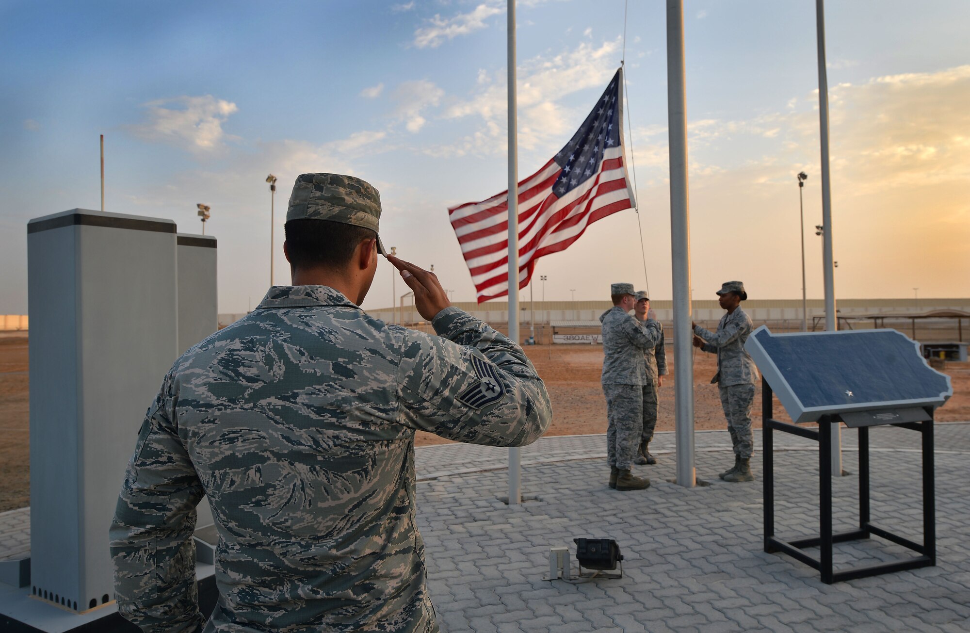 Staff Sgt. Steven, 380th Expeditionary Security Forces Squadron member, salutes during a 9/11 Retreat ceremony at an undisclosed location in Southwest Asia Sept. 11, 2015. The ceremony was held to honor the 2,977 lives lost from the 9/11 attacks. (U.S. Air Force Photo/Tech. Sgt. Jeff Andrejcik)