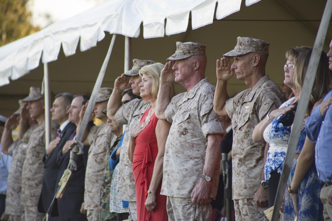 U.S. Marine Corps Lt. Gen. Richard P. Mills, outgoing commander, Marine Forces Reserve (MFR) and Marine Forces North (MFN), and Lt. Gen. Rex C. McMillian, commander, MFR and MFN, salute during the posting of the colors at the change of command ceremony held at Marine Corps Support Facility, New Orleans, La., Sept.  12, 2015. Lt. Gen. Richard P. Mills passed his duties as commander of Marine Forces Reserve and Marine Forces North to Lt. Gen. McMillian after commanding for over two years. (U.S. Marine Corps Photo by Lance Cpl. Kimberly Aguirre/Released)