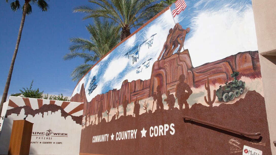Marine Week Phoenix mural is unveiled in Scottsdale, Ariz., Sept. 12, 2015. Five Marine artists worked for nearly a week in temperatures upwards of 100 degrees to finish the mural celebrating relationships built during the week between the Corps and the people of Arizona.