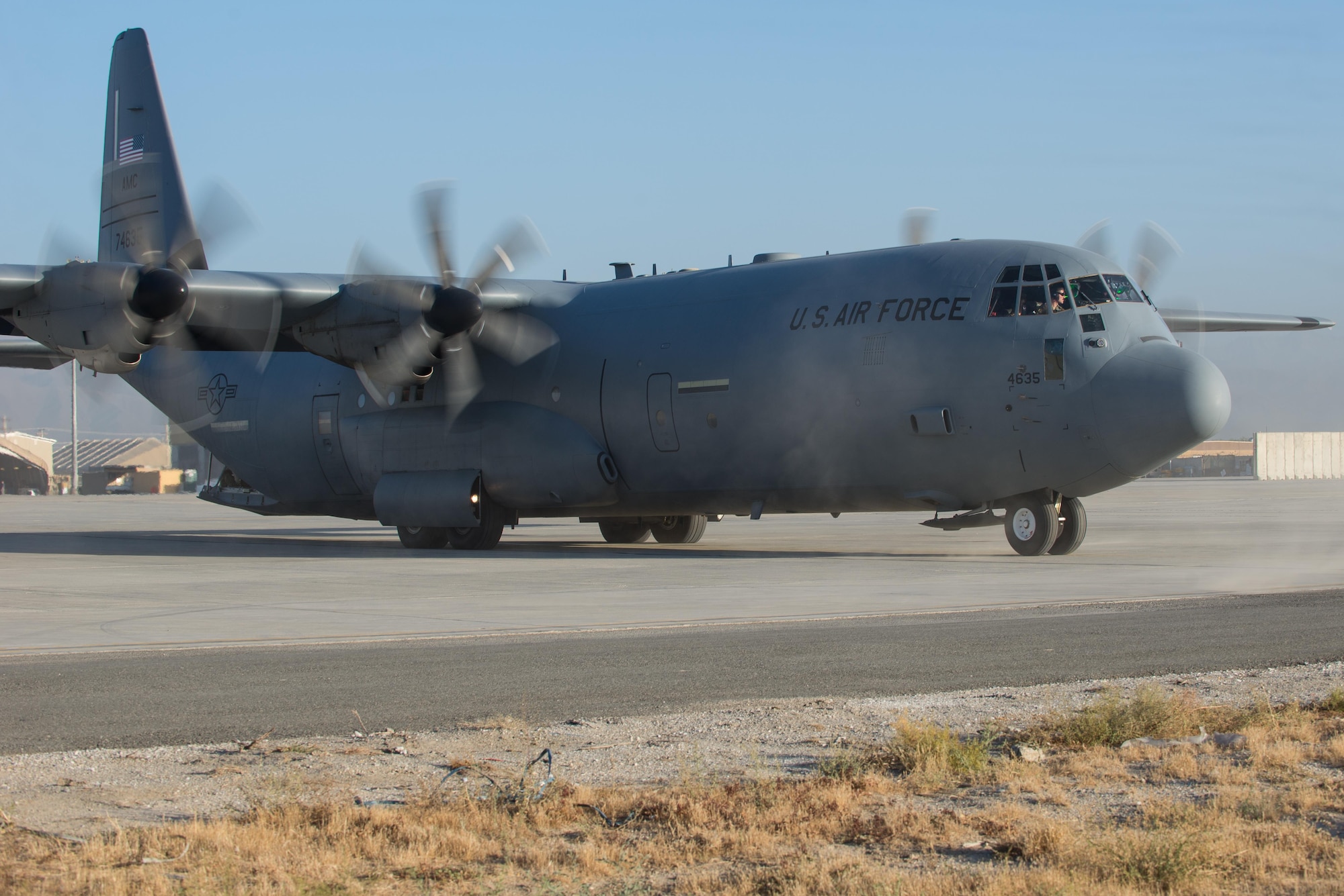 A U.S. Air Force C-130J Super Hercules aircraft assigned to the 774th Expeditionary Airlift Squadron taxis before departing Bagram Airfield, Afghanistan, Sept. 12, 2015. The aircraft and the rest of the squadron were in the process of redeploying back to Little Rock Air Force Base after successfully completing their deployment. During their rotation as the 774th Expeditionary Airlift Squadron, the Little Rock team completed 1,850 combat sorties and moved 14,500 passengers and 17 million pounds of cargo.  (U.S. Air Force photo by Tech. Sgt. Joseph Swafford/Released) 