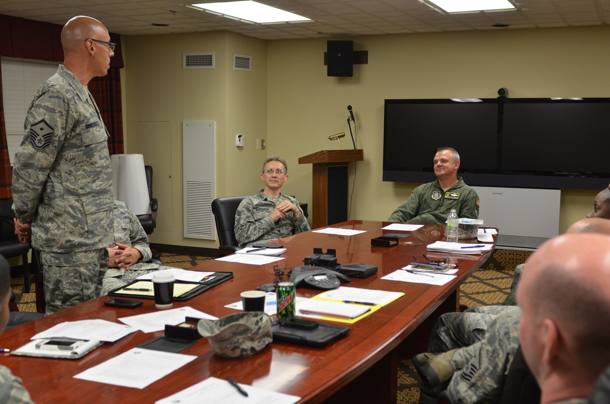 Col. D. Scott Durham listens to an introduction by Master Sgt. Juan Gonzalez, 512th Force Support Squadron, during the First Sergeant Council meeting before his first Unit Training Assembly as 512th Airlift Wing commander on Sept. 11, 2015 at Dover Air Base, Delaware. At the meeting, the wing's first sergeants discussed pressing issues amongst the enlisted force, while Colonel Durham outlined his top-level priorities. (U.S. Air Force photo/1st Lt. Steve Lewis)
