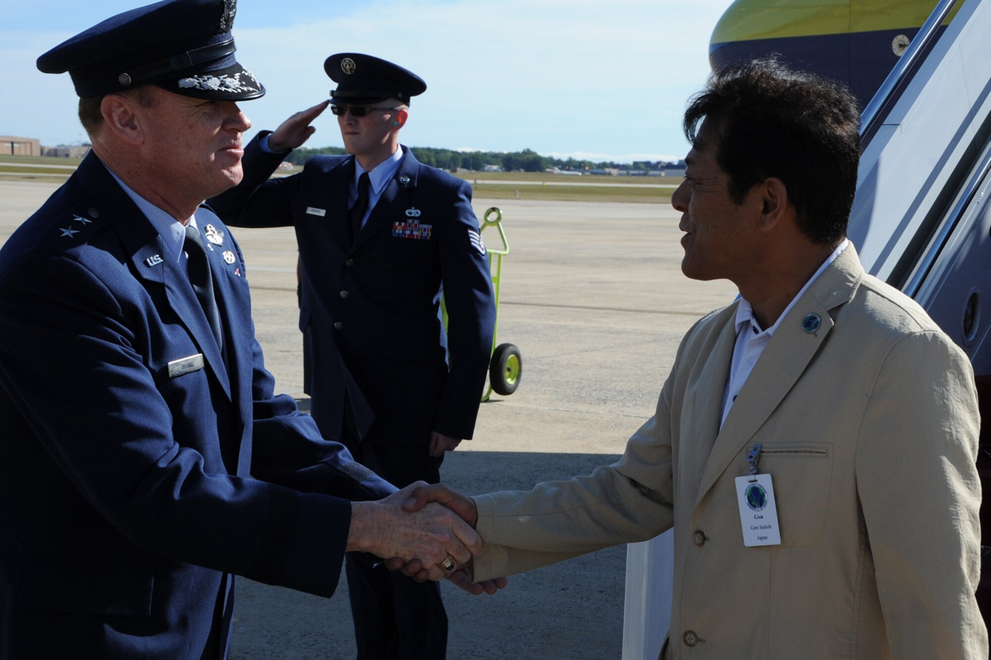 Air Force District of Washington Commander Maj. Gen. Darryl Burke greets Gen. Harukazu Saitoh, Japan Air Self-Defense Force Chief of Staff, along with other Air Force leaders from the Pacific region on Joint Base Andrews, Md., Sep. 13. The leaders are visiting as part of the Pacific Air Chiefs’ Symposium, one of the Air Force's multilateral engagement opportunities used to build relationships with Pacific countries and to enhance theater security cooperation. The Air Force District of Washington brings air, space and cyberspace capabilities to the joint team protecting the nation's capital, and supports local personnel and those serving worldwide. (U.S. Air Force photo/Staff Sgt. Matt Davis)