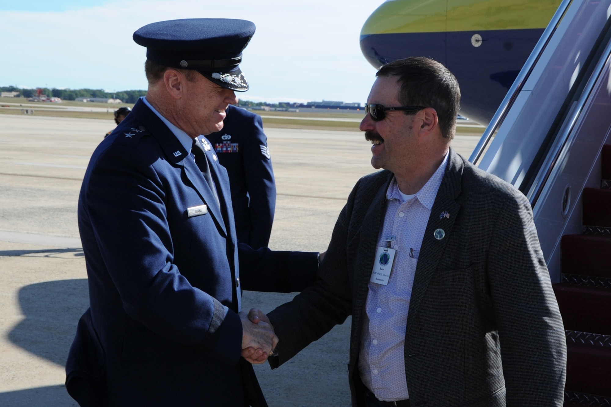 Air Force District of Washington Commander Maj. Gen. Darryl Burke greets Air Marshal Gavin Davies, Chief of the Royal Australian Air Force, along with other Air Force leaders from the Pacific region on Joint Base Andrews, Md., Sep. 13. The leaders are visiting as part of the Pacific Air Chiefs’ Symposium, one of the Air Force's multilateral engagement opportunities used to build relationships with Pacific countries and to enhance theater security cooperation. The Air Force District of Washington brings air, space and cyberspace capabilities to the joint team protecting the nation's capital, and supports local personnel and those serving worldwide. (U.S. Air Force photo/Staff Sgt. Matt Davis)