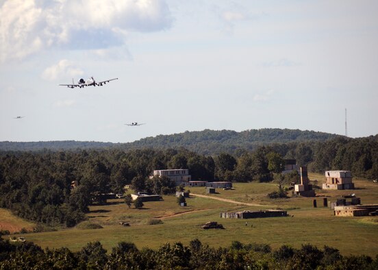 Central Missouri community members watch as A-10 fighter aircraft of the 442nd Fighter Wing fly over an outreach event hosted by the Missouri Air National Guard’s 131st Bomb Wing, Detachment 1 - Cannon Range, near Laquey, Missouri, Sept. 12, 2015.  More than 850 guests participated in the family-friendly event that included munitions demonstrations by the B-2 Spirit stealth bomber, A-10 Thunderbolt II attack aircraft, and  C-130 Hercules transport. (U.S. Air National Guard photo by Senior Airman Nathan Dampf)