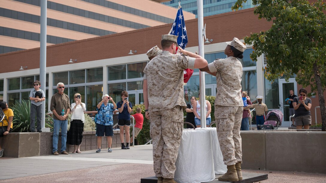 Marines retire the American flag for the last time in the city of Phoenix at Civic Space Park Sept. 13, 2015. More than 800 Marines participated in Marine Week Phoenix to give the citizens of the greater Phoenix area the opportunity to meet the individual Marines and celebrate community, country and Corps.