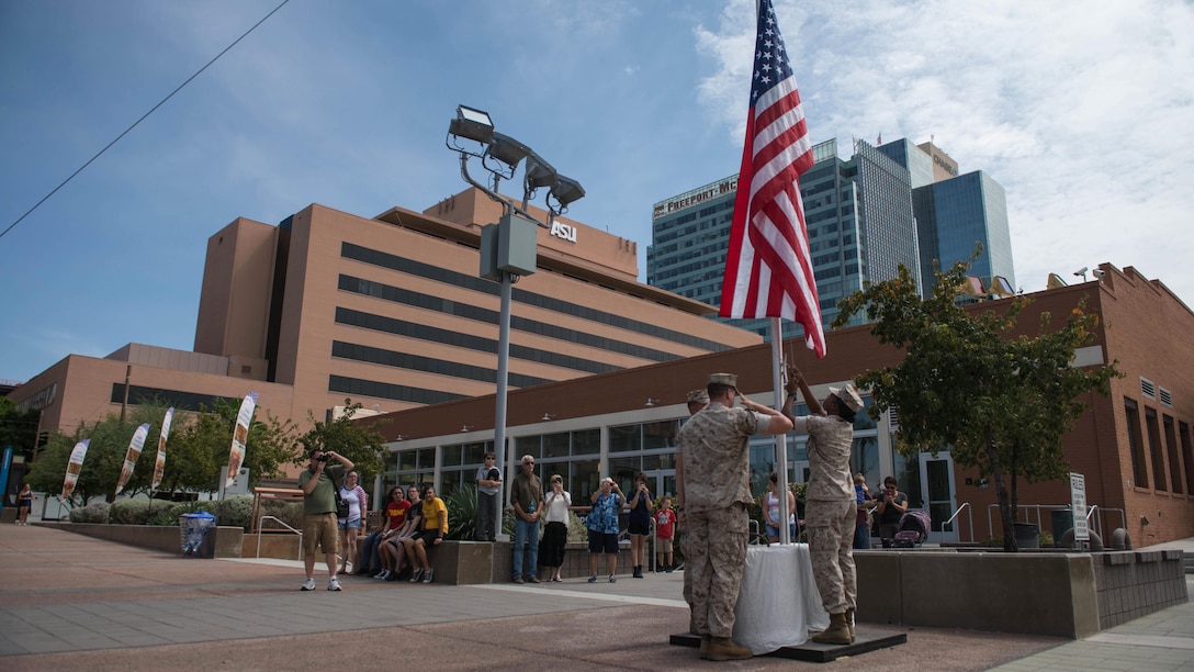 Marines retire the American flag for the last time in the city of Phoenix at Civic Space Park Sept. 13, 2015. More than 800 Marines participated in Marine Week Phoenix to give the citizens of the Valley of the Sun the opportunity to meet the individual Marines and celebrate community, country and Corps.