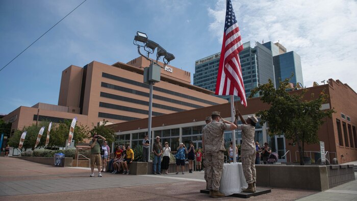 Marines retire the American flag for the last time in the city of Phoenix at Civic Space Park Sept. 13, 2015. More than 800 Marines participated in Marine Week Phoenix to give the citizens of the Valley of the Sun the opportunity to meet the individual Marines and celebrate community, country and Corps.