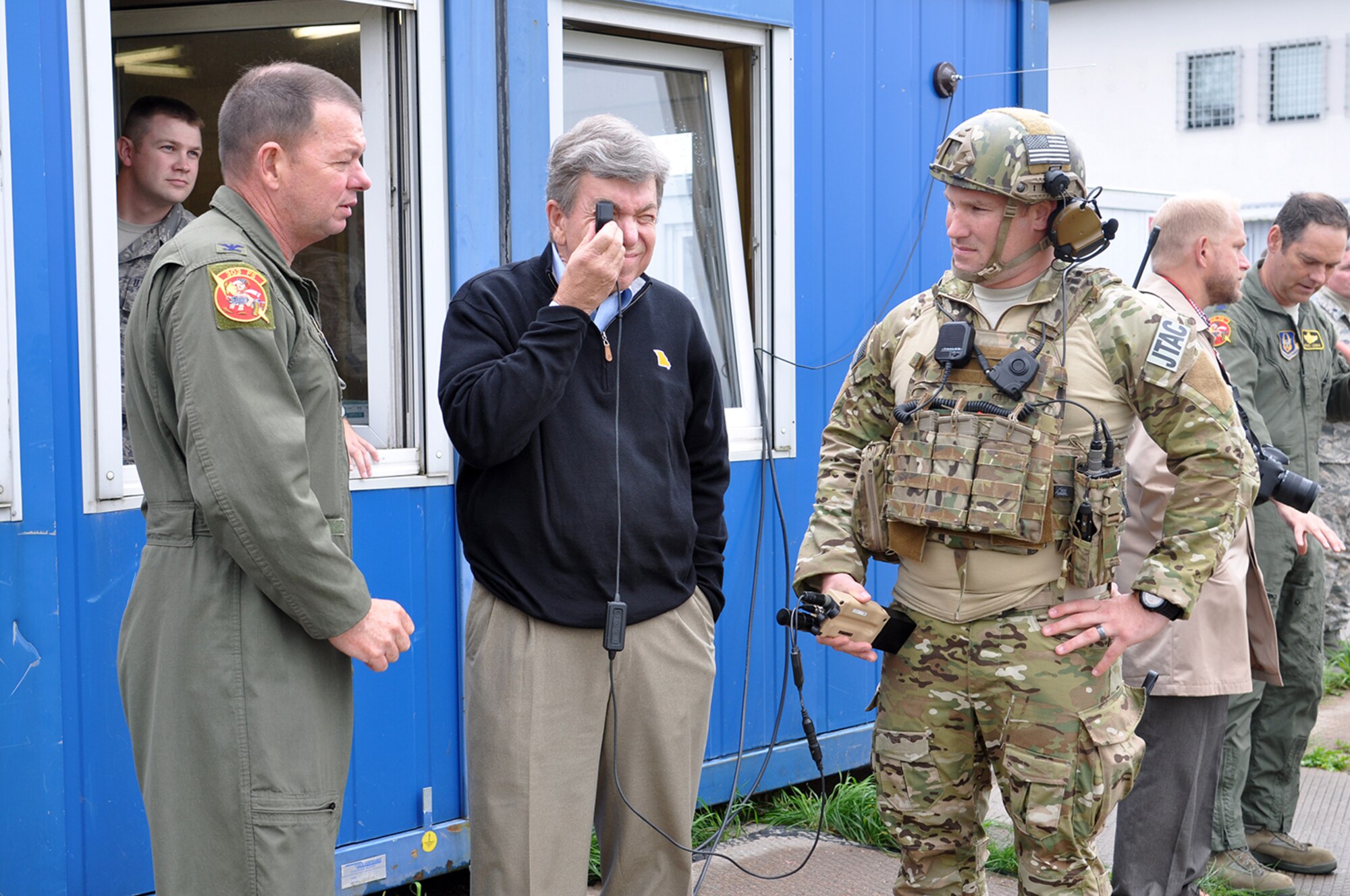U.S Senator Roy Blunt (R), Missouri, works with Col. James Macaulay, 442nd Operations Group commander and Joint Terminal Attack Controller Tech Sgt. Ben Lake from the 146th Air Operations Support Squadron, during a JTAC demonstration with A-10 Thunderbolt IIs at Amari Air Base, Estonia Sept. 7. Blunt visited the base where the U.S. military is supporting Operation Atlantic Resolve. (U.S Air Force photo by Capt. Denise Haeussler)