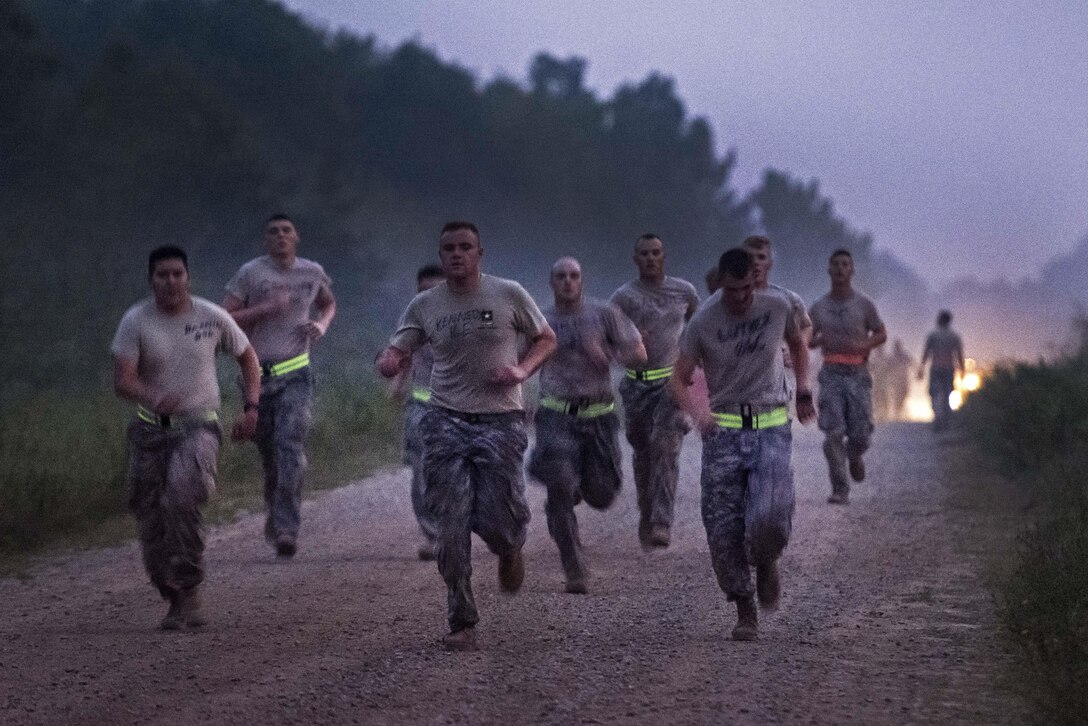 Army Reserve and National Guard combat engineers conduct a 2-mile run during the Sapper Stakes 2015 Army Physical Fitness Test on Fort Chaffee, Ark., Aug. 31, 2015. U.S. Army photo by Master Sgt. Michel Sauret