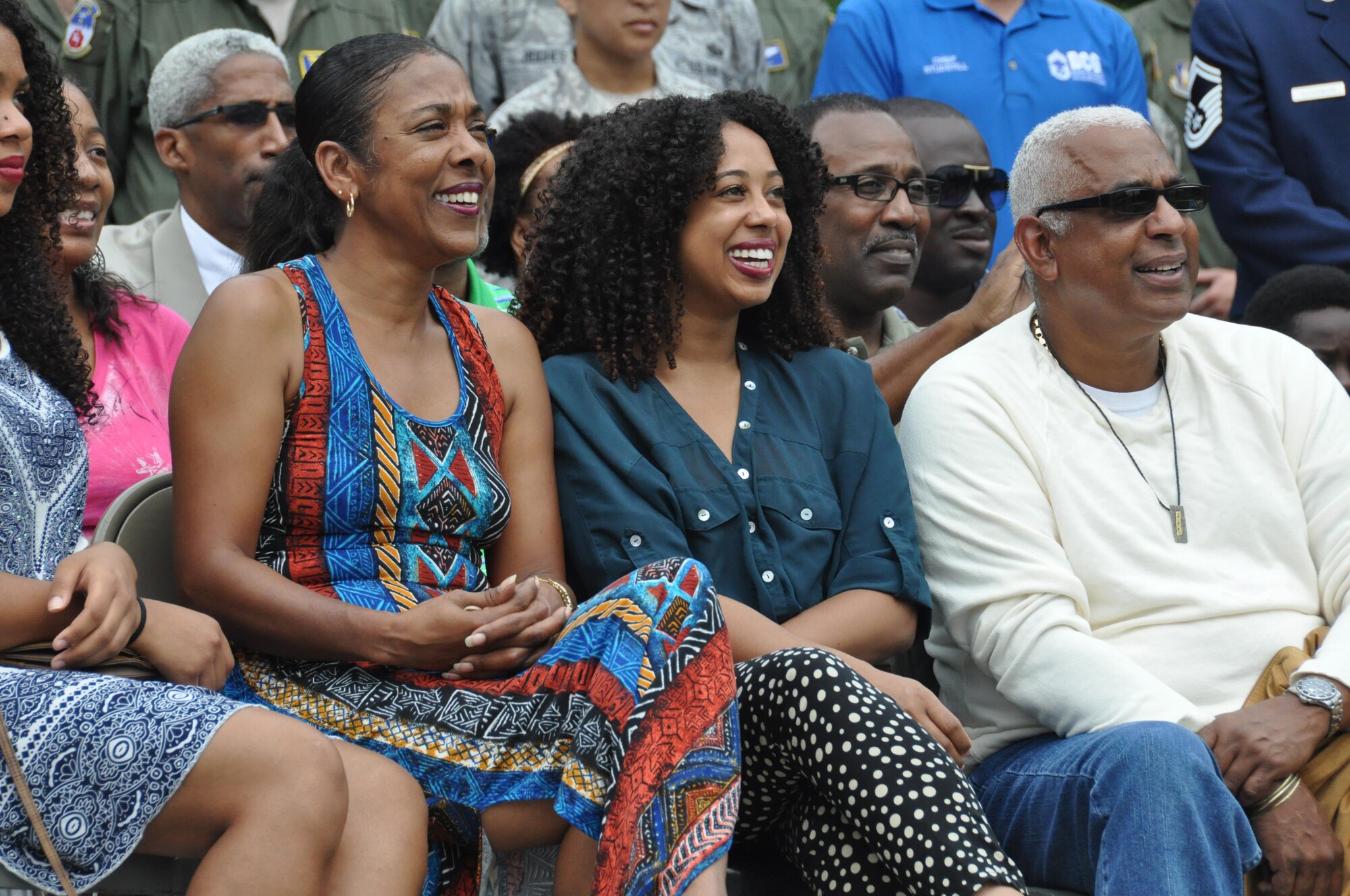 Members of Lt. Col. Aundra Billups’ family enjoy the Billups Avenue Road dedication ceremony at Dobbins Air Reserve Base, Ga. Sep. 12, 2015. Billups, a former Dobbins pilot, passed away Sep. 11, 2013 and was honored by receiving a road dedication in his name. (U.S. Air Force photo/ Senior Airman Miles Wilson)
