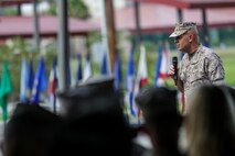 U.S. Marine Corps Lt. Gen. David H. Berger, I Marine Expeditionary Force Commanding General, addresses the crowd during the 1st Marine Division change of command ceremony at Marine Corps Base Camp Pendleton, Calif., Sept. 10, 2015. The ceremony signifies the transfer of responsibility and authority of 1st Marine Division between Commanding Generals. (U.S. Marine Corps photo by Pfc. Nathaniel Castillo, 1st Marine Division Combat Camera/Released)