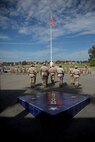 U.S. Marines, Sailors, and family members attend a change of command ceremony at Marine Corps Base Camp Pendleton, Calif., Sept. 10, 2015. The ceremony signifies the transfer of responsibility and authority of 1st Marine Division between Commanding Generals. (U.S. Marine Corps photo by Sgt. Luis A. Vega, 1st Marine Division Combat Camera/Released)