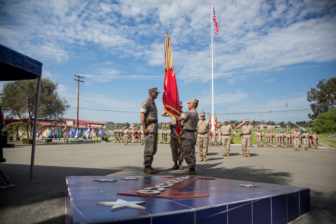 U.S. Marine Corps Brig. Gen. Daniel D. Yoo,  1st Marine Division Commanding General, relinquishes command to Maj. Gen. Daniel J. O’Donohue during a change of command ceremony on Marine Corps Base Camp Pendleton, Calif., Sept. 10, 2015. The ceremony signifies the transfer of responsibility and authority of 1st Marine Division between Commanding Generals. (U.S. Marine Corps photo by Sgt. Luis A. Vega, 1st Marine Division Combat Camera/Released)