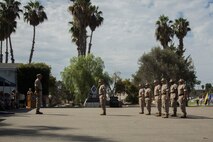 U.S. Marines, Sailors, and family members attend a change of command ceremony at Marine Corps Base Camp Pendleton, Calif., Sept. 10, 2015. The ceremony signifies the transfer of responsibility and authority of 1st Marine Division between Commanding Generals. (U.S. Marine Corps photo by Sgt. Luis A. Vega, 1st Marine Division Combat Camera/Released)