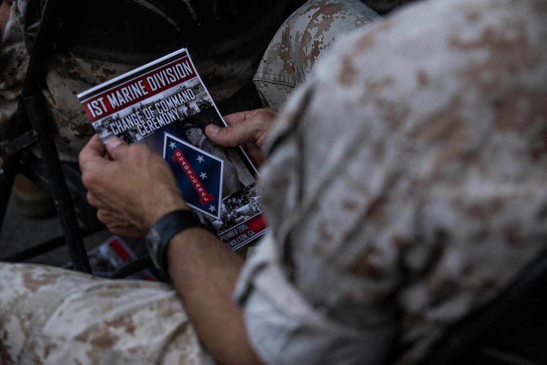 U.S. Marines, Sailors, and family members attend a change of command ceremony at Marine Corps Base Camp Pendleton, Calif., Sept. 10, 2015. The ceremony signifies the transfer of responsibility and authority of 1st Marine Division between Commanding Generals. (U.S. Marine Corps photo by Sgt. Luis A. Vega, 1st Marine Division Combat Camera/Released)