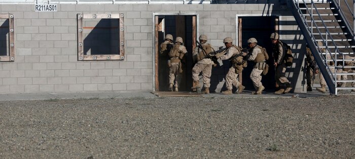 Marines with Company C, 1st Combat Engineer Battalion, 1st Marine Division, practice using detonation cord to breach doors during Exercise Pioneer Express aboard Marine Corps Base Camp Pendleton, Calif., Sept. 2, 2015. The exercise ensures that Marines and Sailors remain effective in increasingly complex environments through challenging training and detailed evaluation. (U.S. Marine Corps photo by Staff Sgt. Bobbie Curtis)