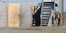 Marines with Company C, 1st Combat Engineer Battalion, 1st Marine Division, practice using detonation cord to breach doors during Exercise Pioneer Express aboard Marine Corps Base Camp Pendleton, Calif., Sept. 2, 2015. The exercise ensures that Marines and Sailors remain effective in increasingly complex environments through challenging training and detailed evaluation. (U.S. Marine Corps photo by Staff Sgt. Bobbie Curtis)